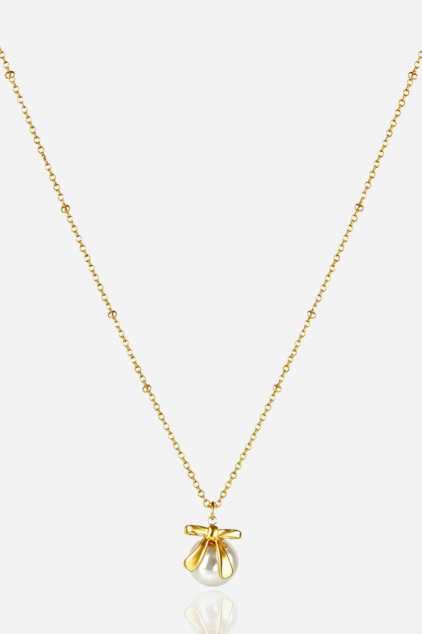 Aurelia Bow Pearl Pendant Necklace in 18K PVD gold plated stainless steel