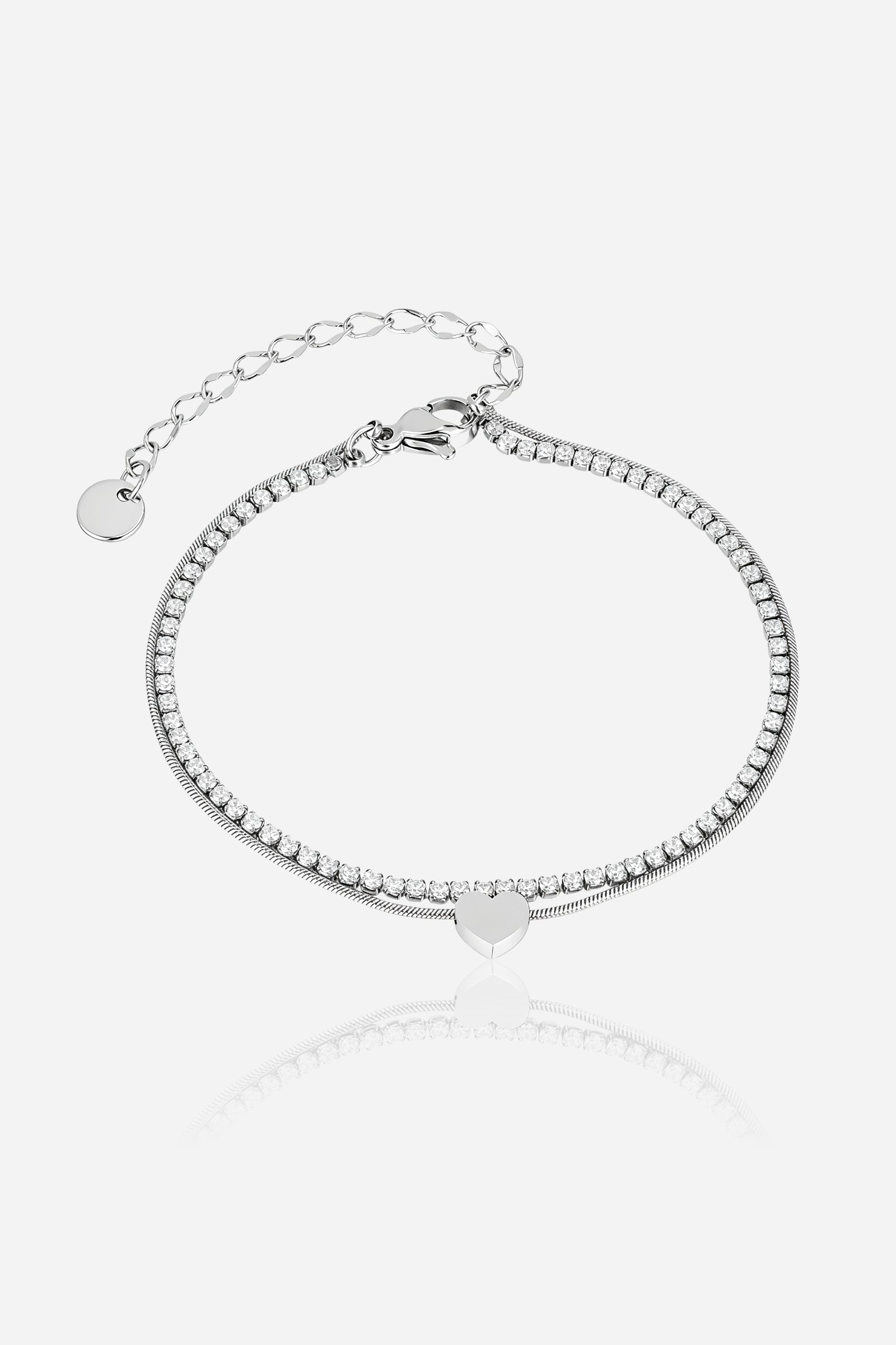GLISTIA Aurora double chain heart tennis bracelet in polished silver stainless steel shown from the front with crystal detailing.