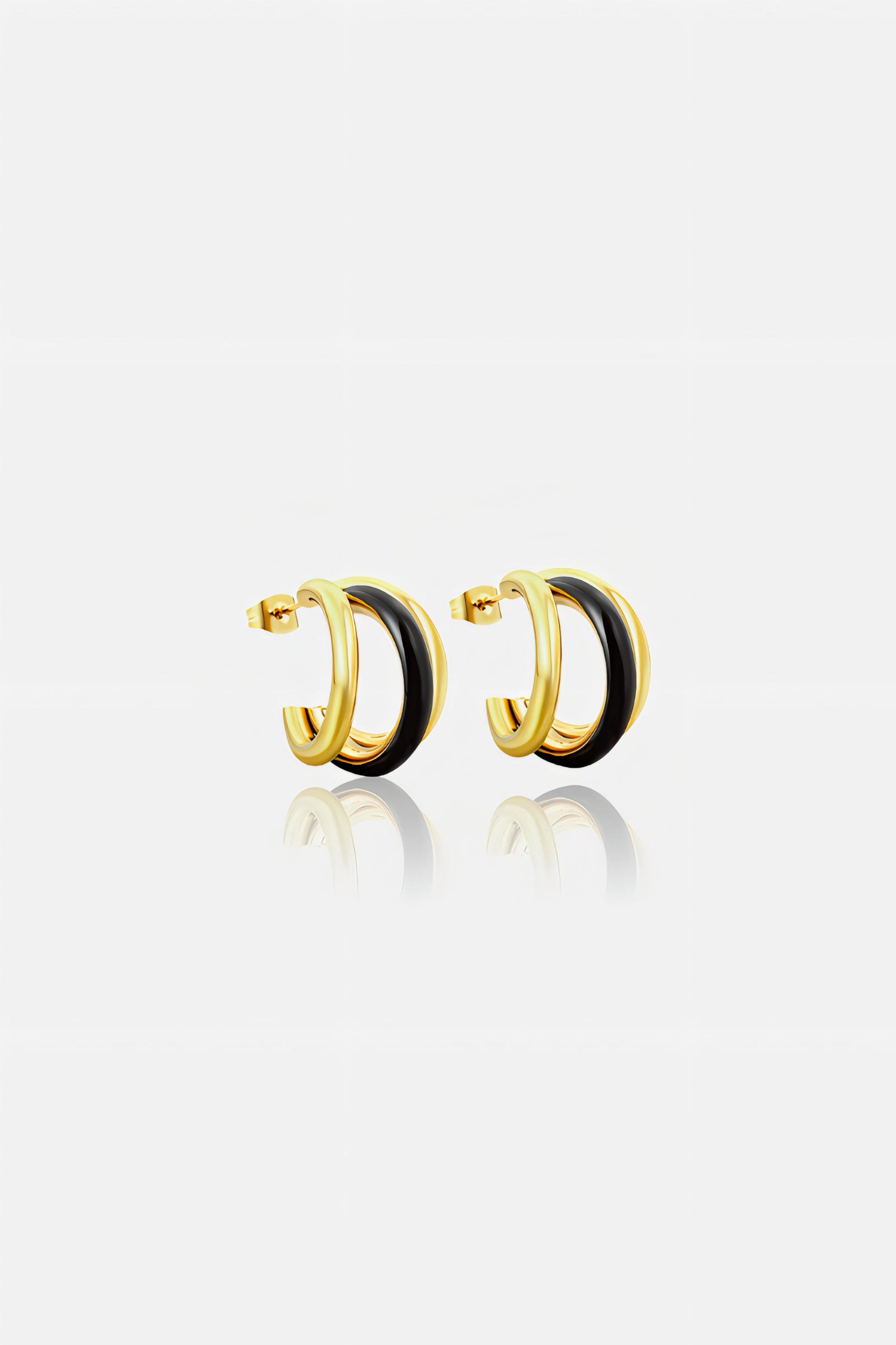 Black and gold double C-hoop earrings in PVD 18K gold plated stainless steel with black enamel finish – modern minimalist jewellery by GLISTIA
