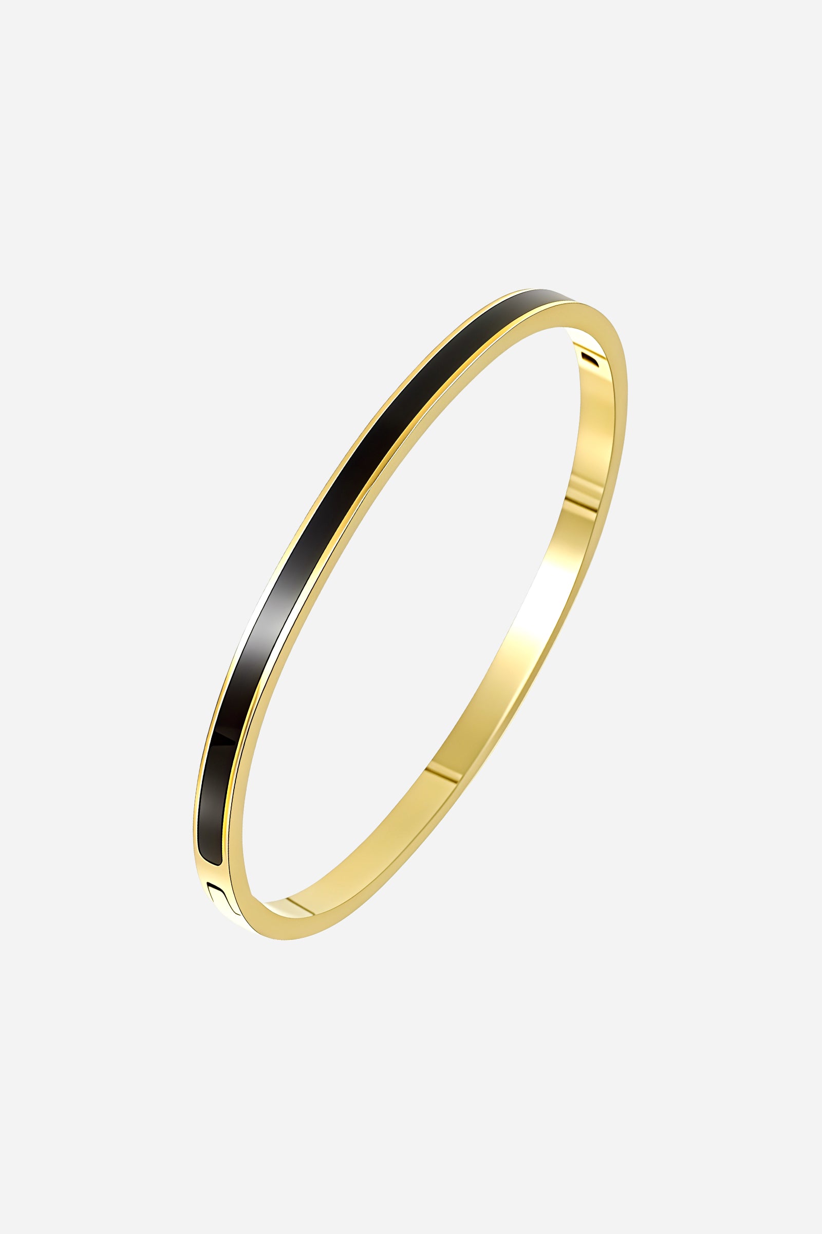 Side perspective of GLISTIA’s Black Enamel Slim Bangle showing its thin profile, glossy finish, and precision-polished gold edges.