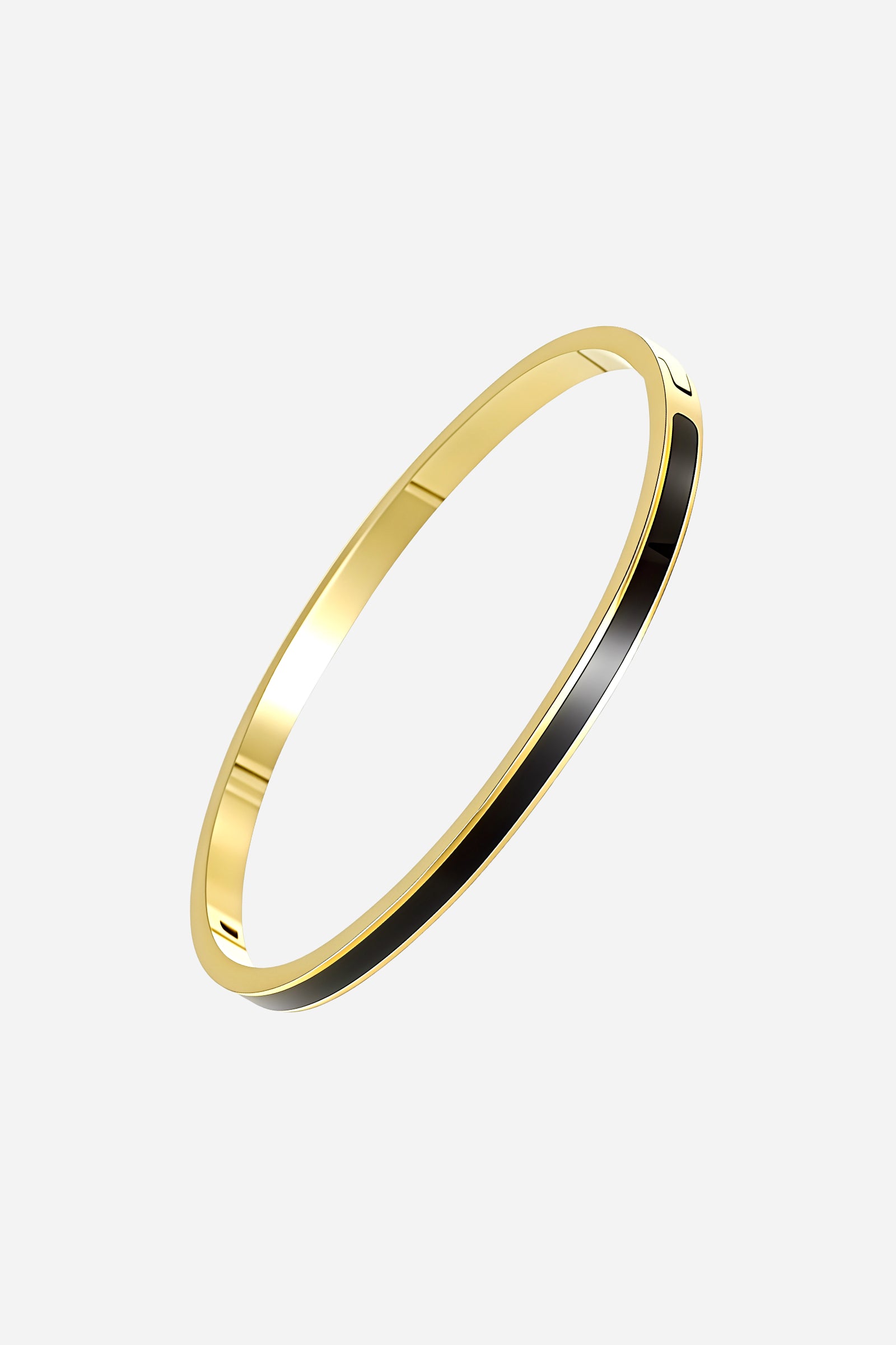 Top-down angle of GLISTIA’s Black Enamel Slim Bangle highlighting the sleek, continuous black enamel stripe set in a polished gold frame.