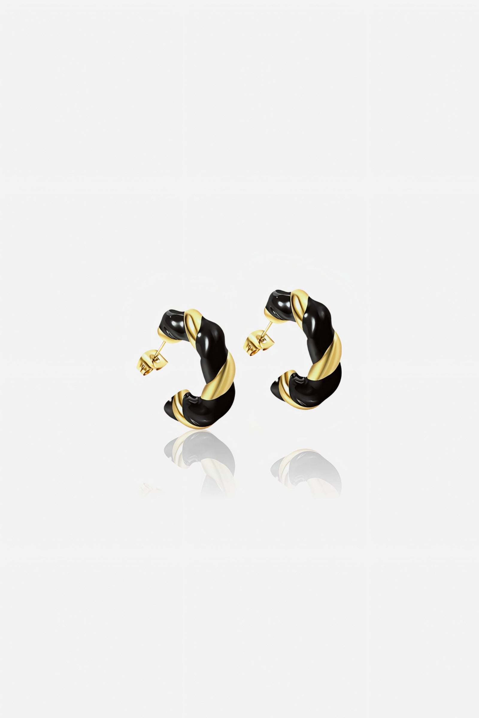 Black and gold twist C-hoop earrings crafted from stainless steel with a PVD 18K gold plated finish and glossy black enamel accents GLISTIA.