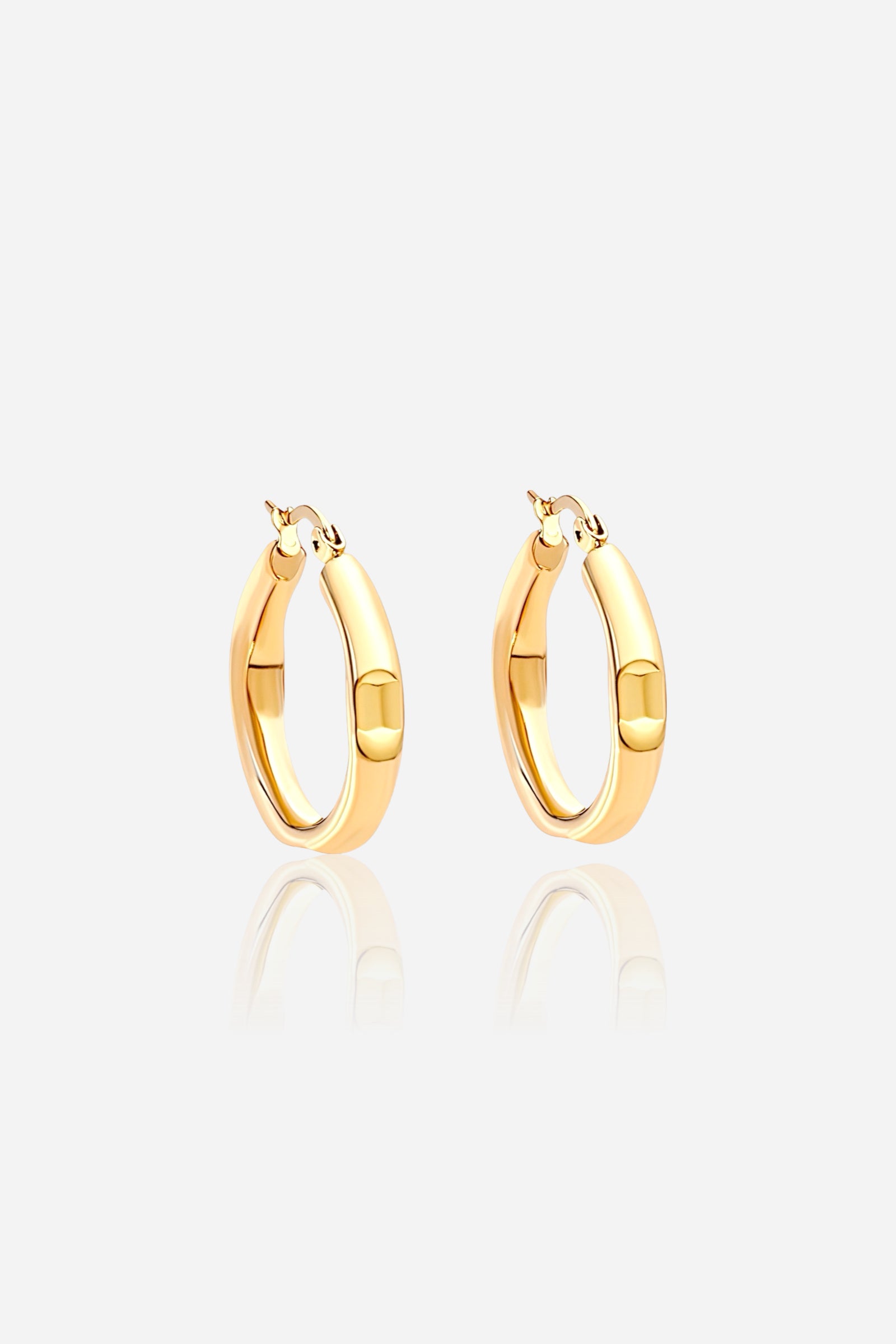 Chunky hoop earrings in 18K PVD gold plated stainless steel, featuring a smooth rounded design with high-shine polished finish — GLISTIA jewellery