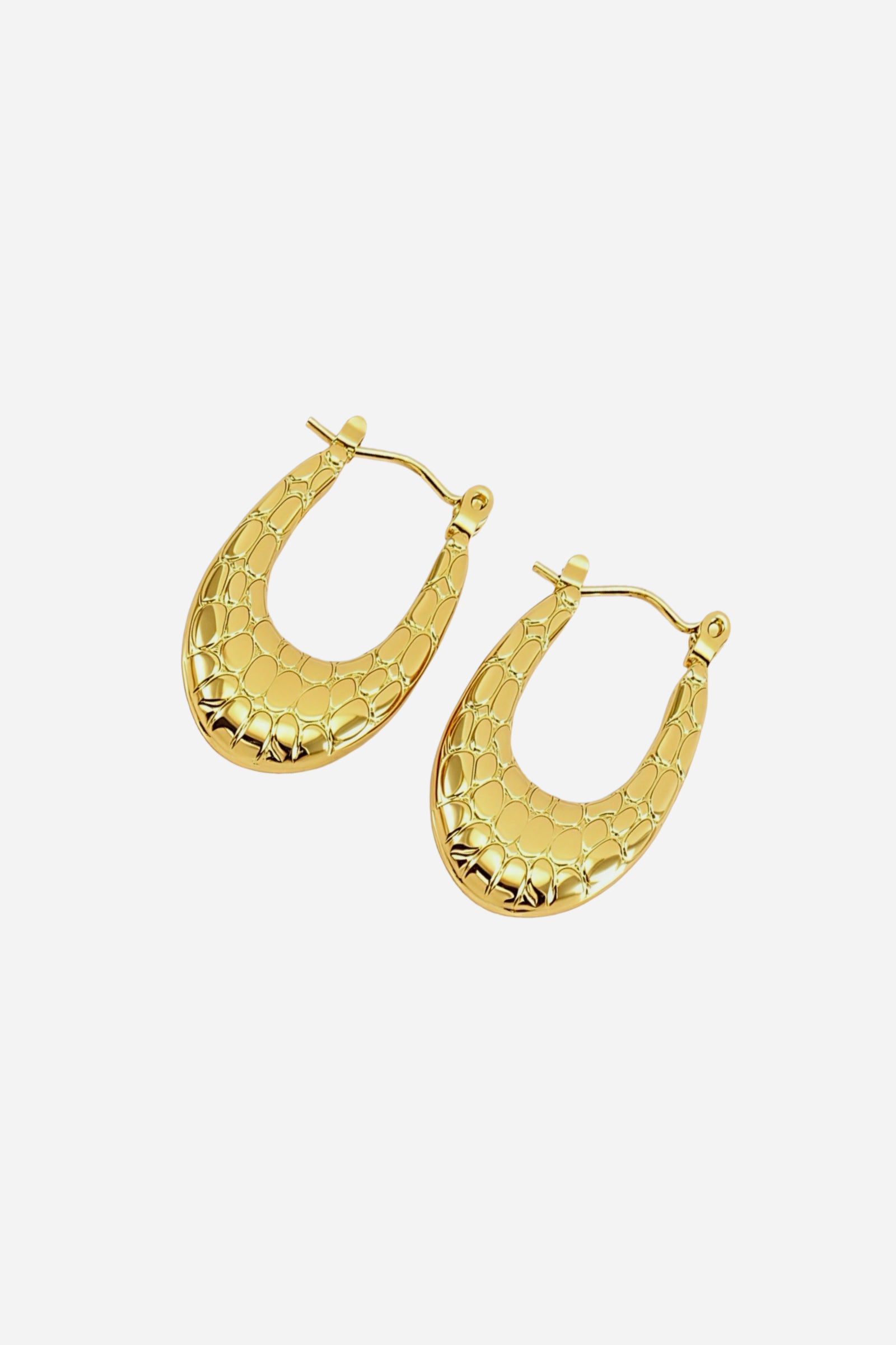 Crocodile embossed U-shape hoop earrings crafted in stainless steel with a polished 18K gold plated finish, featuring a bold textured pattern and elegant curved silhouette – GLISTIA.