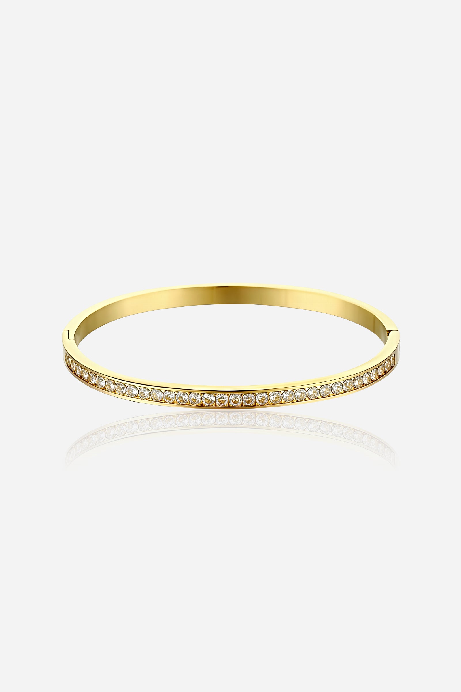 Front view of the Crystal Bar Bangle crafted from stainless steel with PVD 18K gold mirror polish, featuring a crystal-set bar on the front and a plain back – GLISTIA.