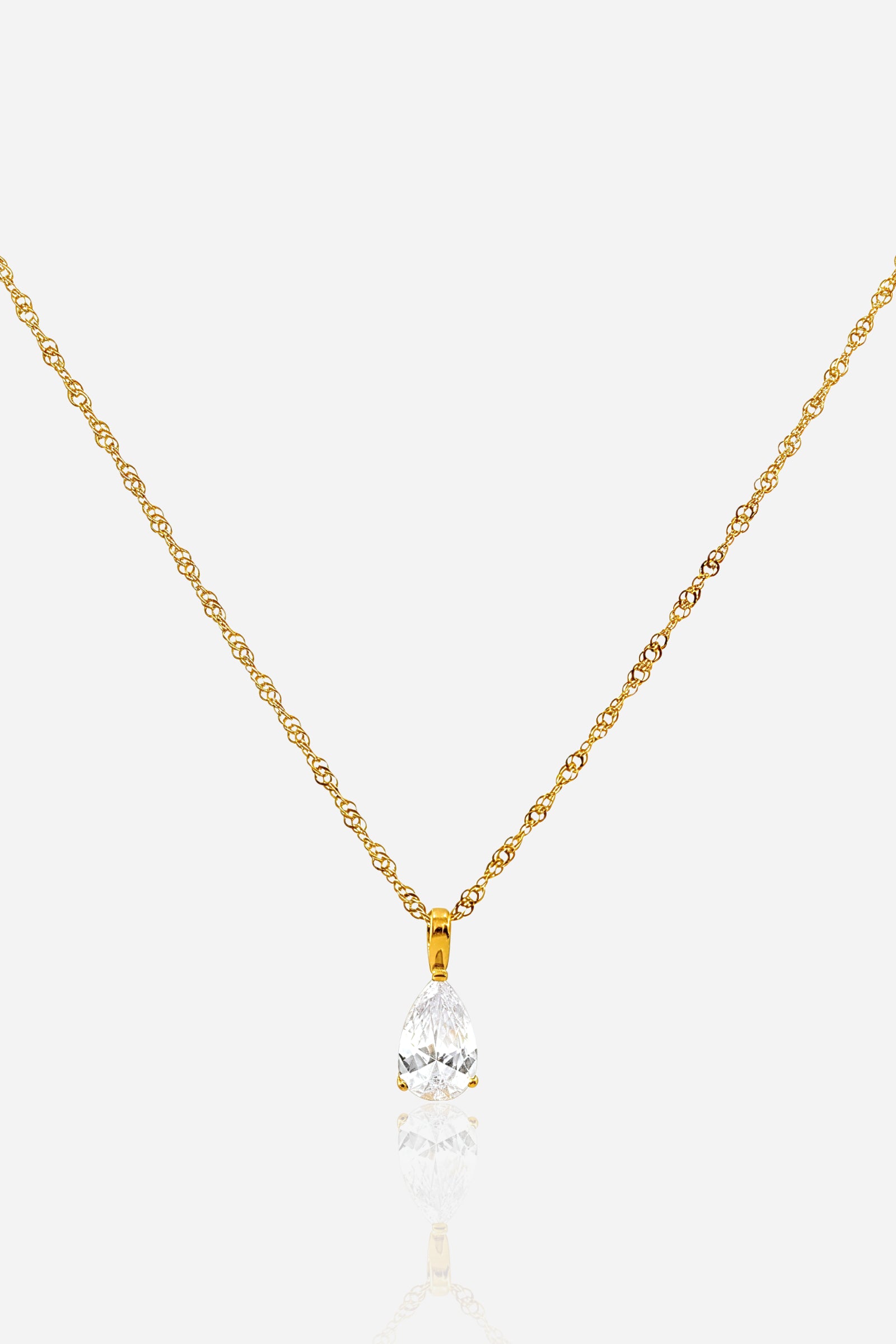 April crystal birthstone pendant necklace in PVD 18K gold plated stainless steel, front view – GLISTIA