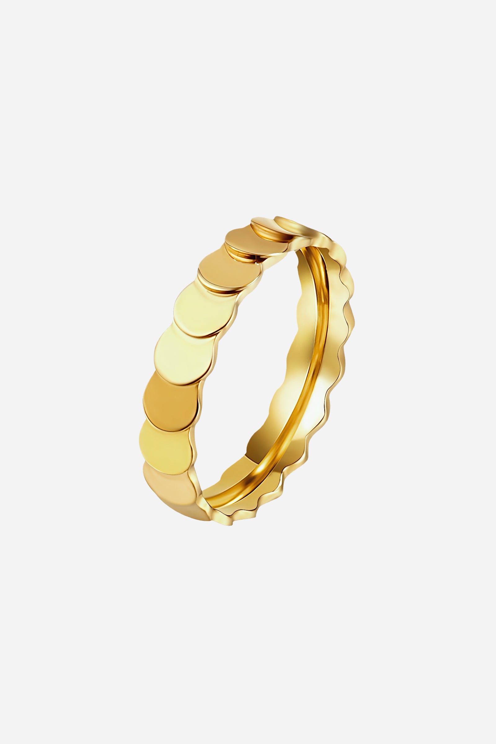 Side-angle image of GLISTIA PVD 18K gold plated disc pattern ring showcasing the textured circular layout.