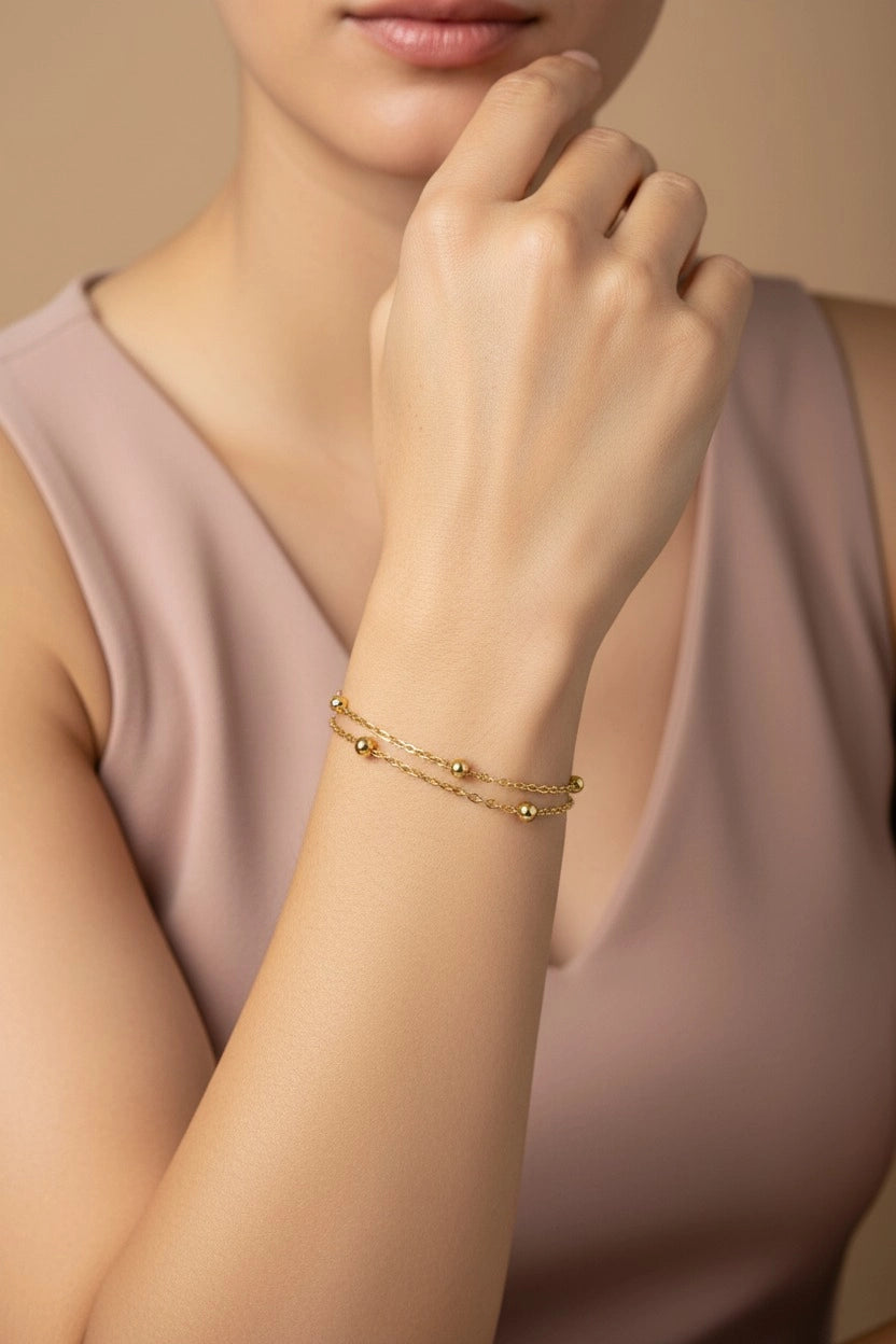 Dual Chain Beaded Gold bracelet in 18K PVD gold plated stainless steel with elegant beaded chain detailing