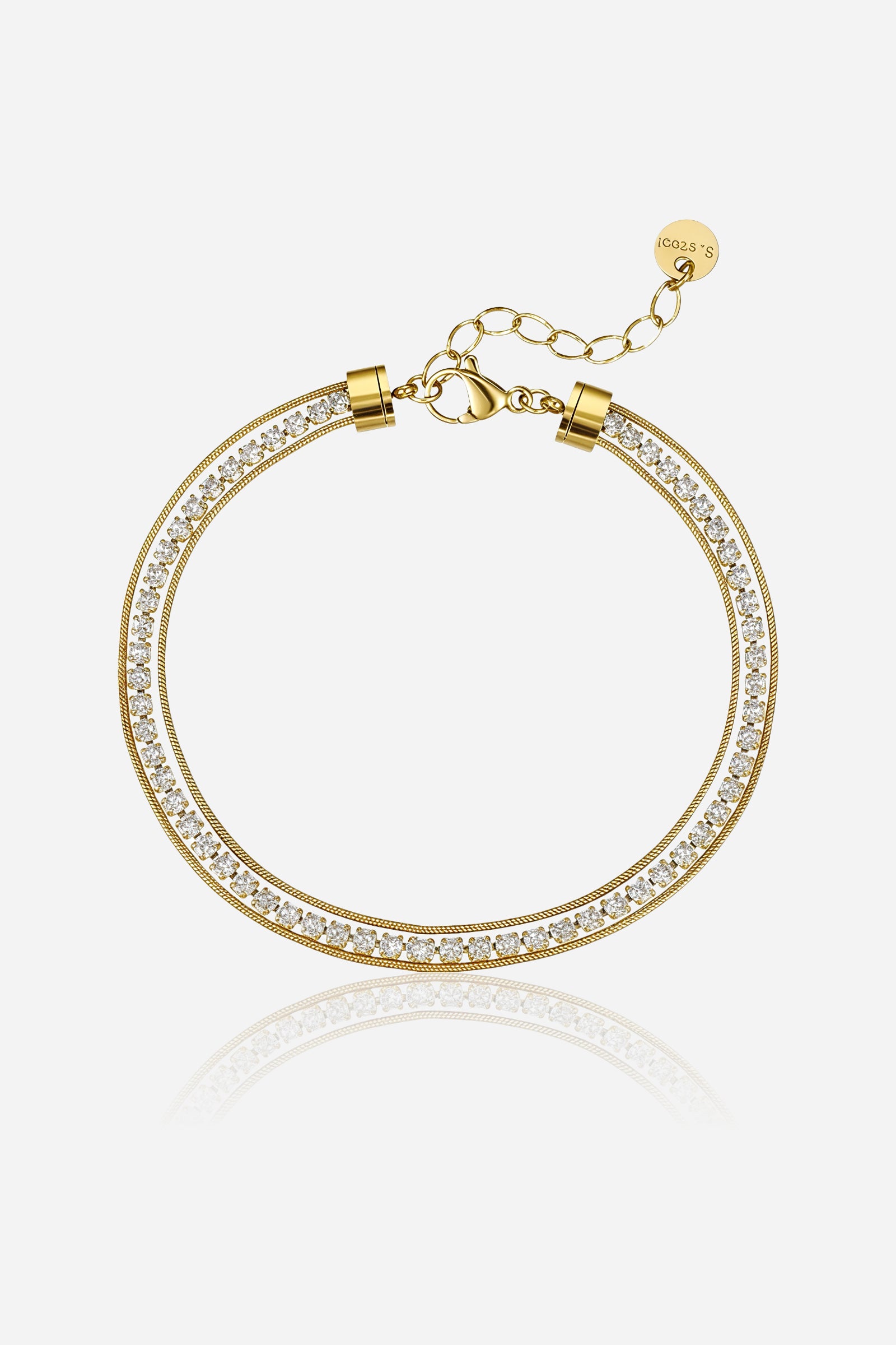 Close-up of GLISTIA’s PVD 18K gold plated dual chain bracelet showcasing the detailed crystal tennis row.