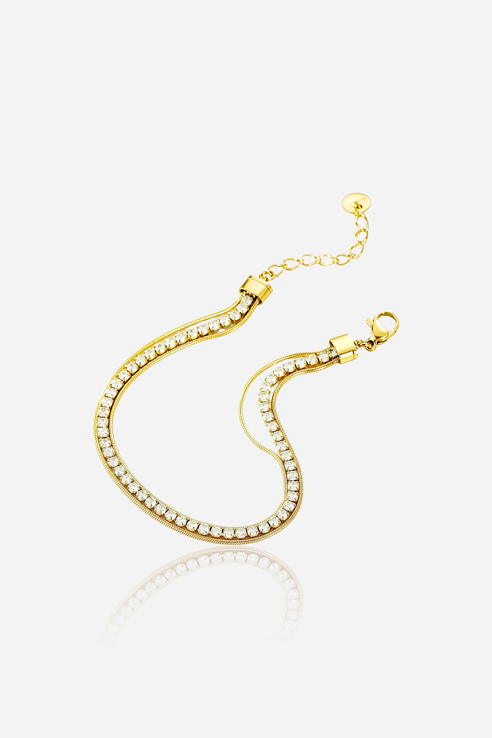 GLISTIA dual chain tennis bracelet in PVD 18K gold plated stainless steel shown from the front, featuring a central row of sparkling crystals.