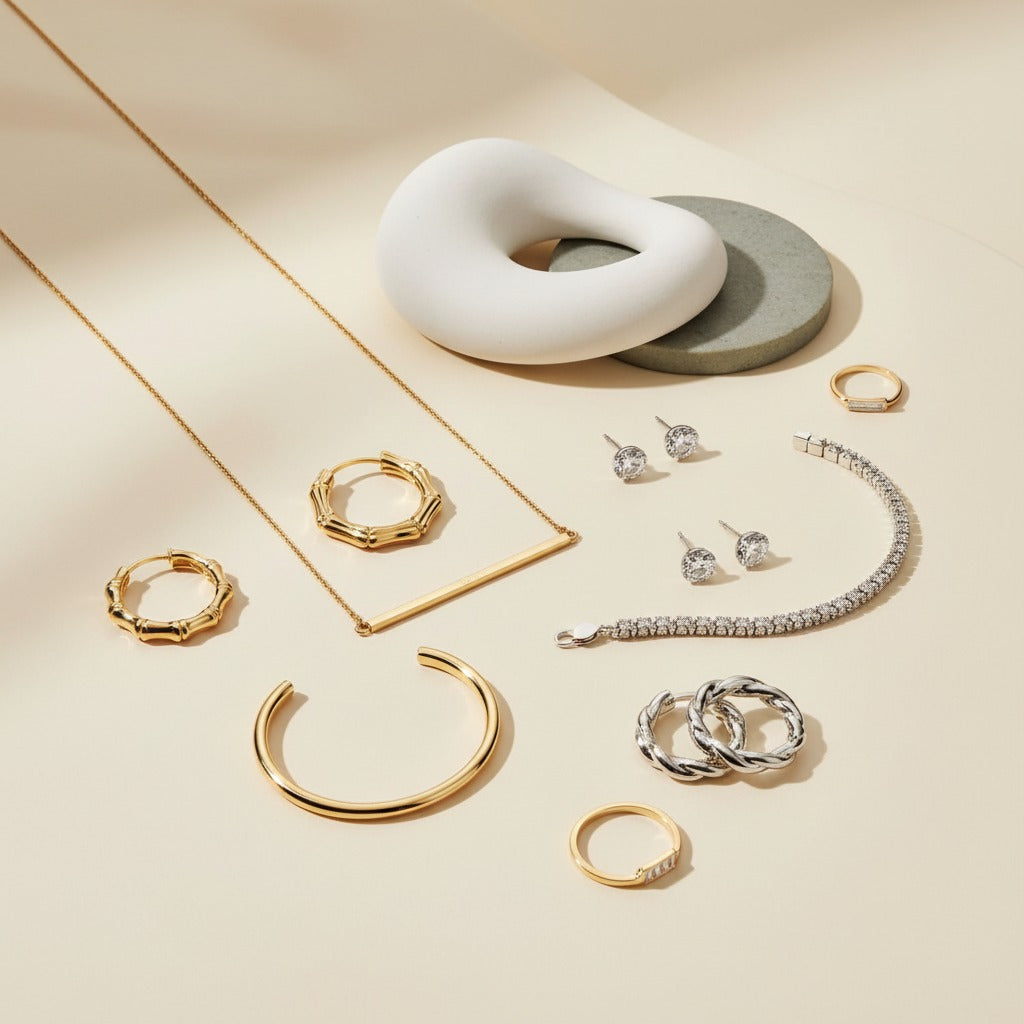 Minimal luxury jewellery flat lay highlighting carefully chosen gold and silver jewellery pieces