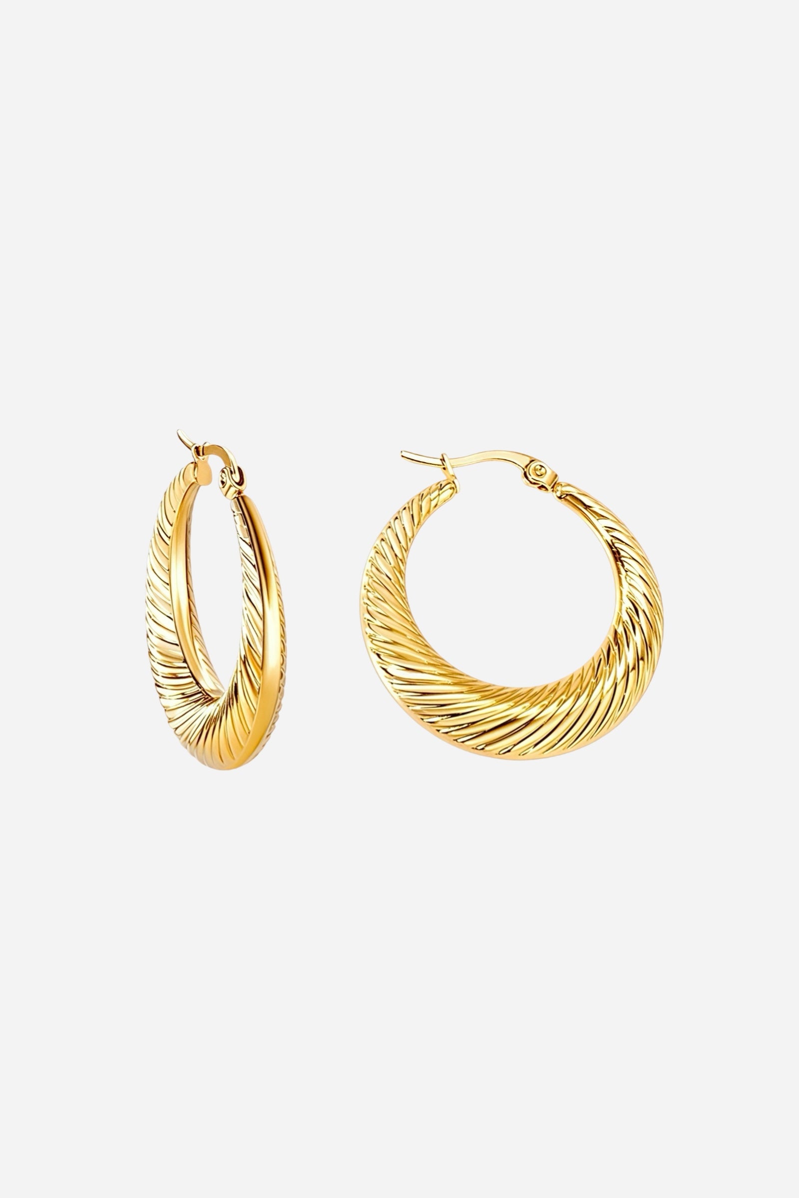 Close-up of Elara Twist Hoop Earrings crafted from stainless steel with elegant spiral texture and a high-shine PVD 18K gold plated finish – GLISTIA.
