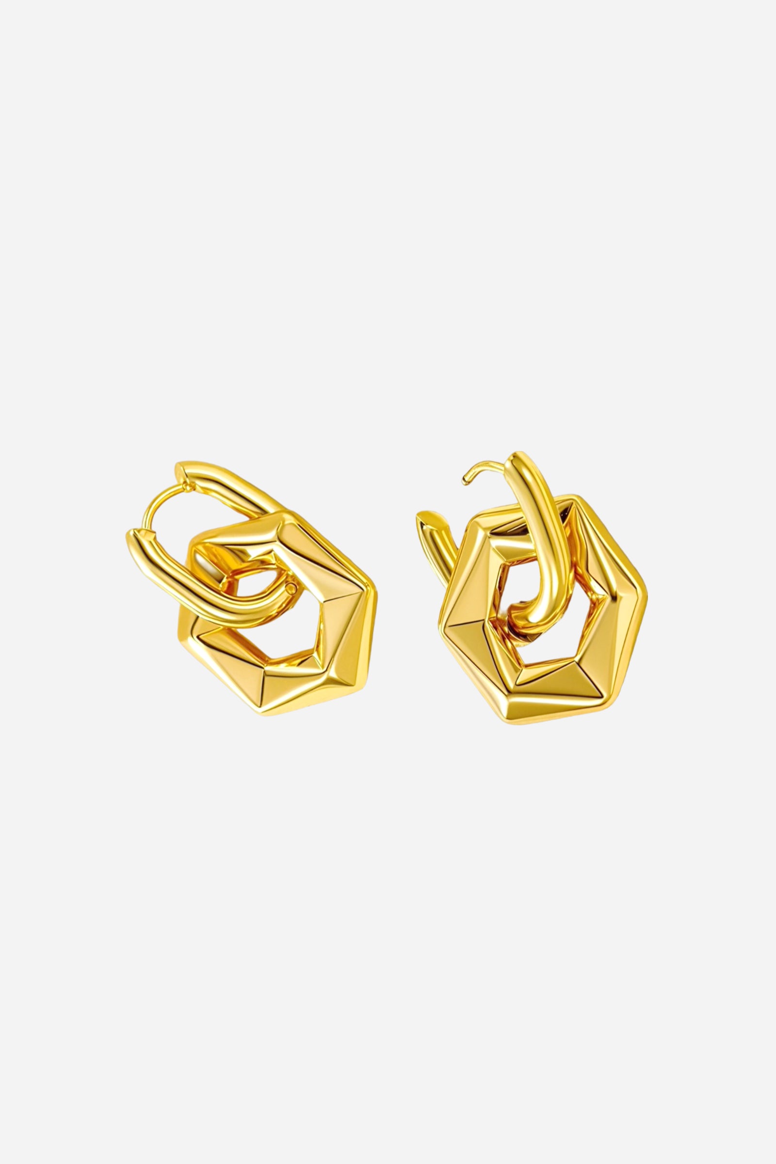 Side view of geometric hexagon drop hoop earrings crafted from stainless steel with a mirror-polished PVD 18K gold-plated finish, featuring a sculpted angular shape – GLISTIA.