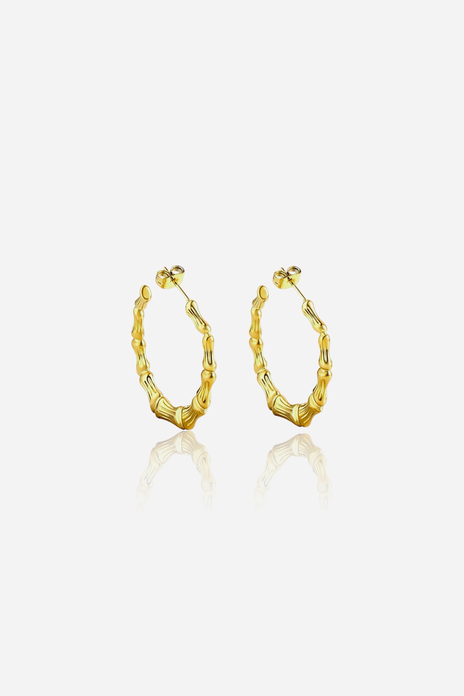 Gold bamboo hoop earrings in PVD 18K gold plated stainless steel – nature inspired hoop design by GLISTIA