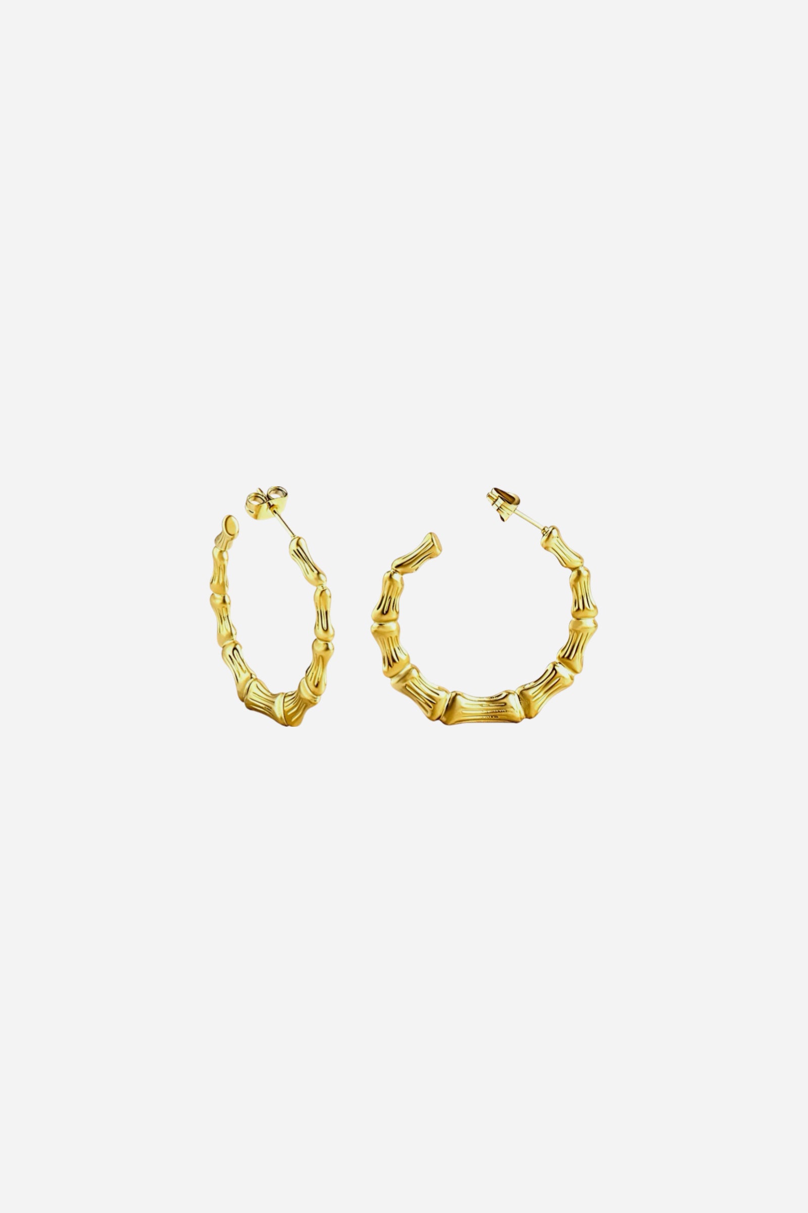 Side view of gold bamboo hoop earrings in PVD 18K gold plated stainless steel – organic textured hoop design by GLISTIA
