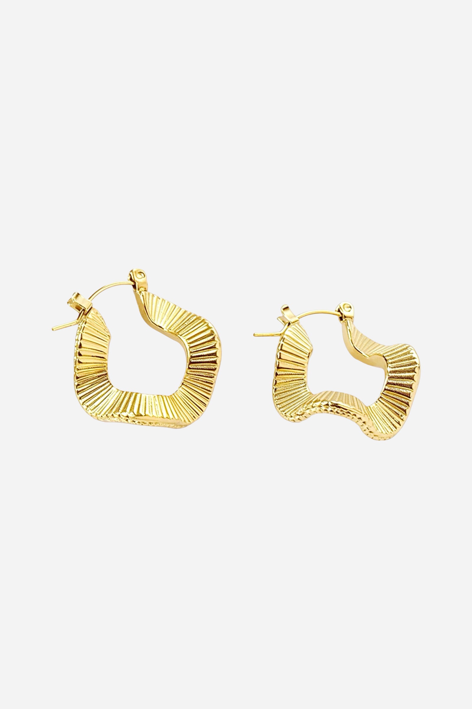 Front side view of 18K gold plated geometric ripple hoop earrings made from stainless steel featuring wavy sculpted texture – GLISTIA gold jewellery