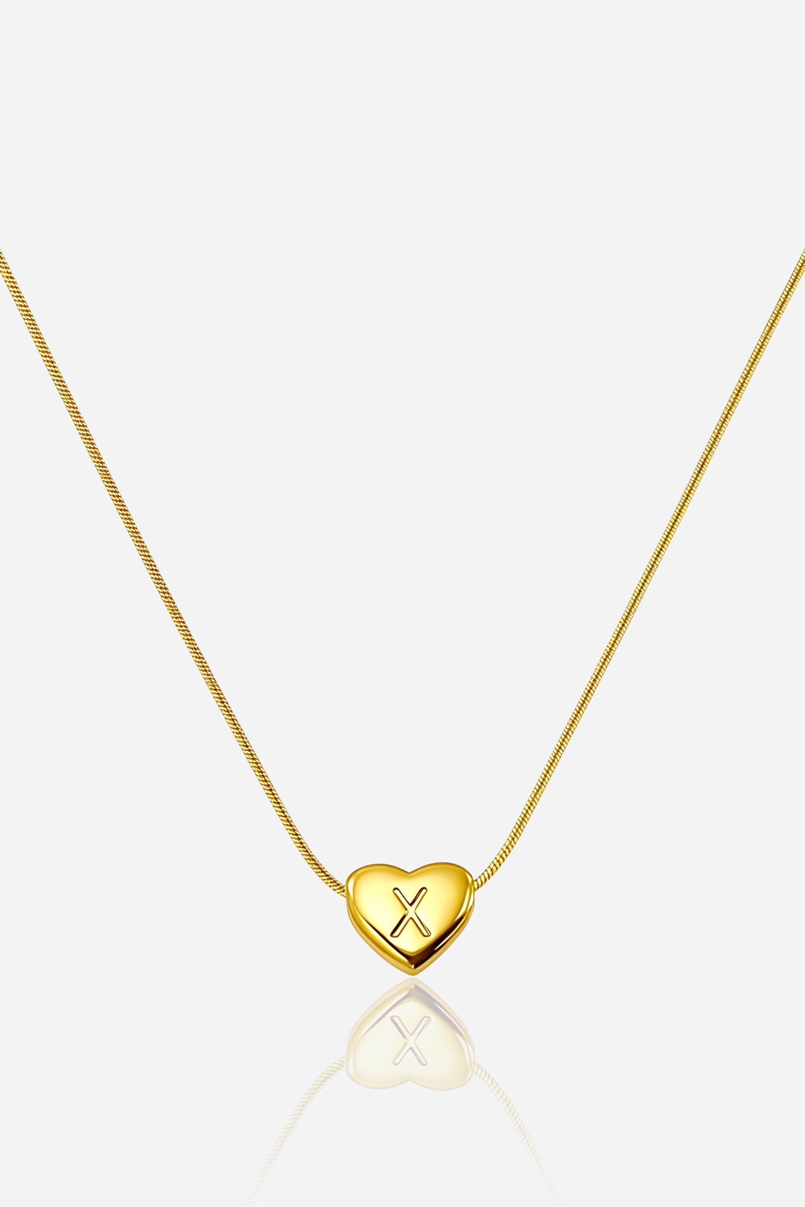 Gold-plated heart initial ‘X’ necklace with engraved pendant on a snake chain, PVD 18K gold plated stainless steel – GLISTIA