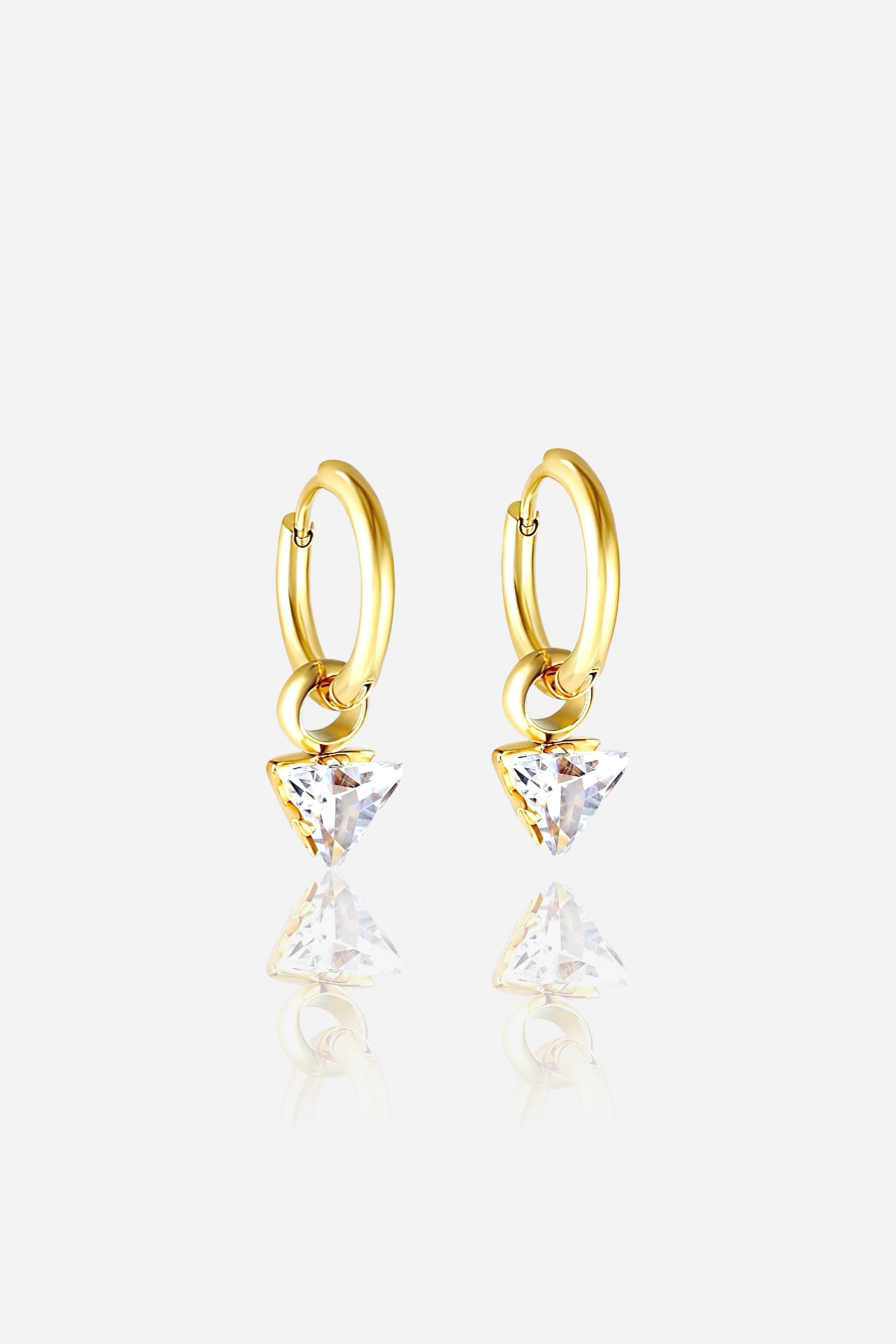 Front view of gold triangle crystal drop hoop earrings featuring a sleek minimalist design with a faceted clear crystal pendant, crafted from stainless steel and finished in polished PVD 18K gold plating – GLISTIA.