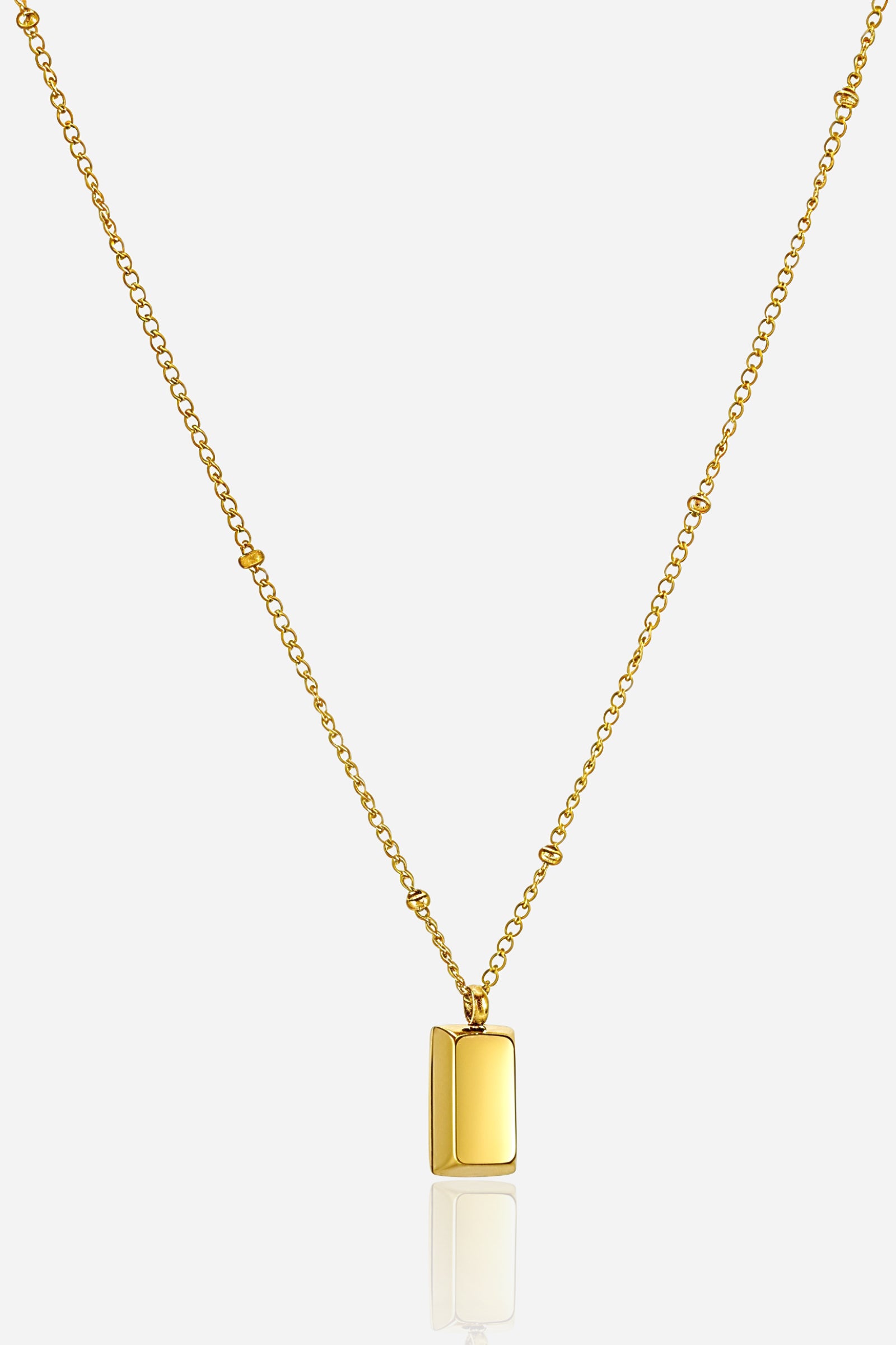Top-view photo of GLISTIA Golden Bar Pendant Necklace featuring polished gold bar pendant.