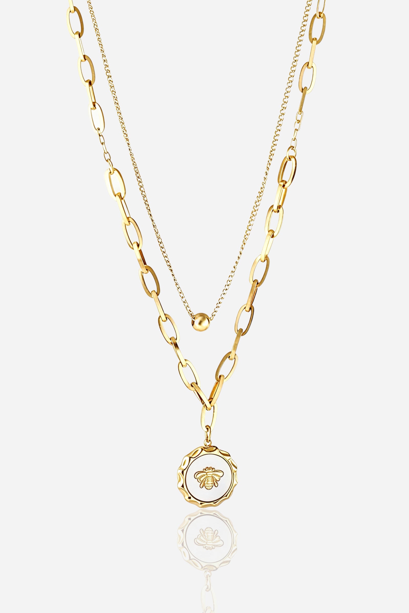 Zoom view of GLISTIA Golden Bee Medallion Layered Necklace with dual chains.