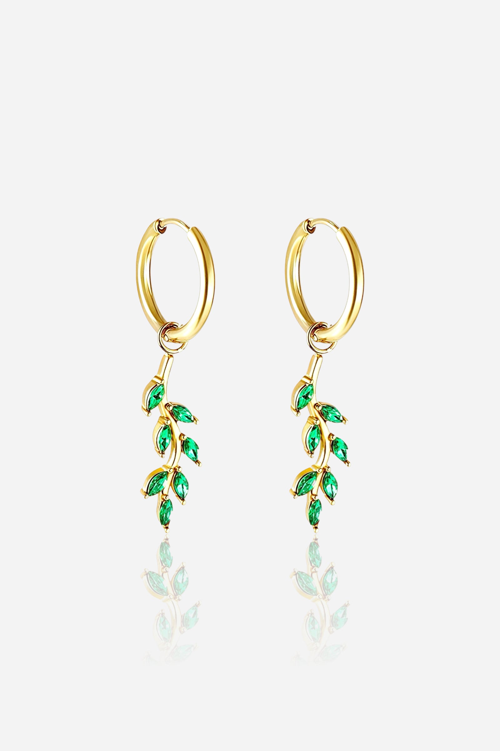 Elegant green leaf dangle hoop earrings crafted from stainless steel with a lustrous PVD 18K gold plated finish, featuring cascading leaf motifs adorned with sparkling green cubic zirconia crystals – GLISTIA.