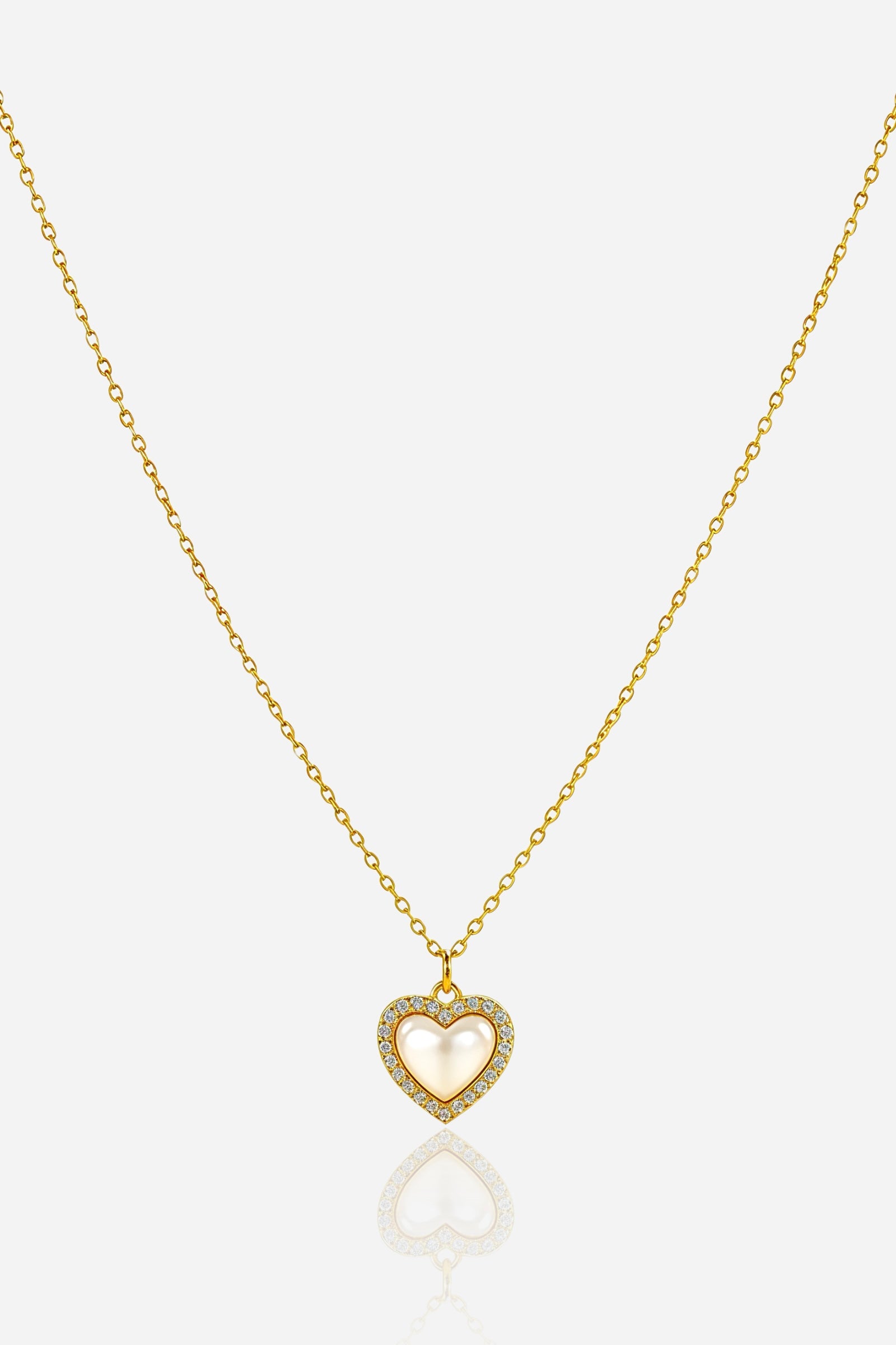 Heart Pendant Necklace with mother-of-pearl centre and cubic zirconia border, 18K PVD gold plated stainless steel – Glistia front view