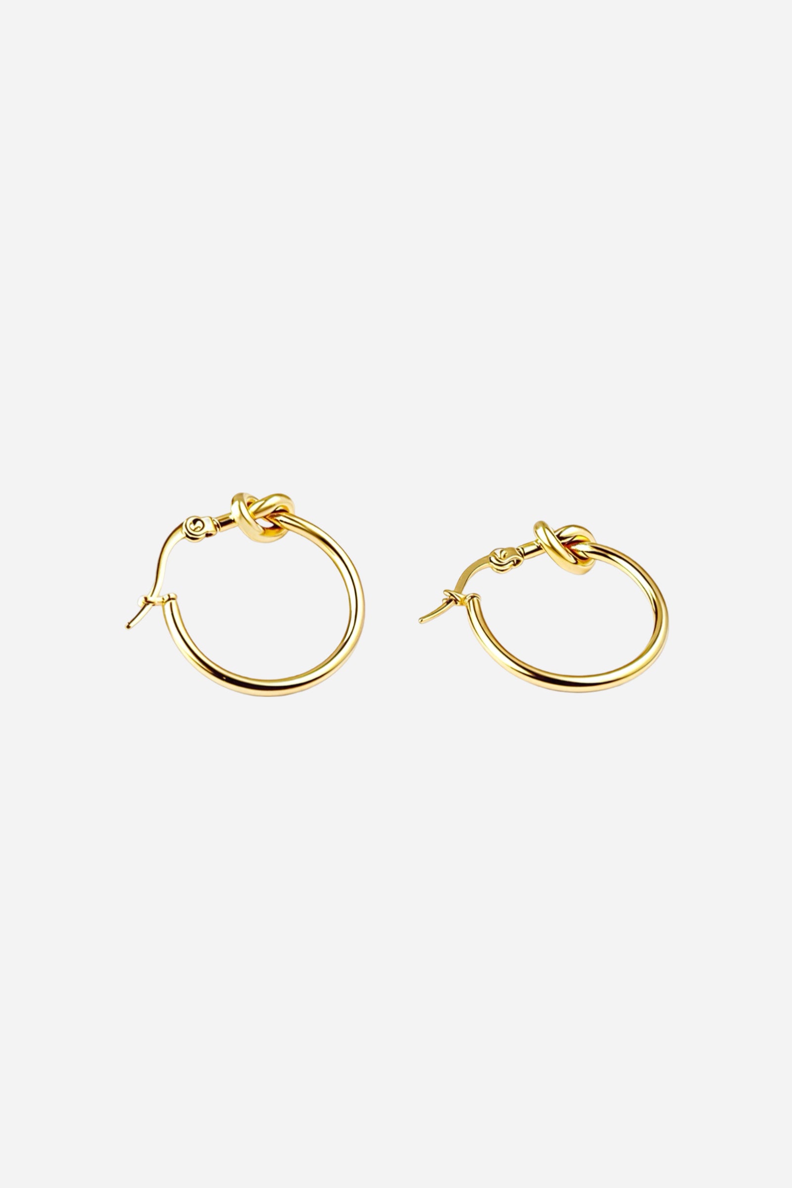 Side view of knot hoop earrings crafted in 18K gold plated stainless steel showcasing a minimalist open hoop with knot accent – GLISTIA jewellery