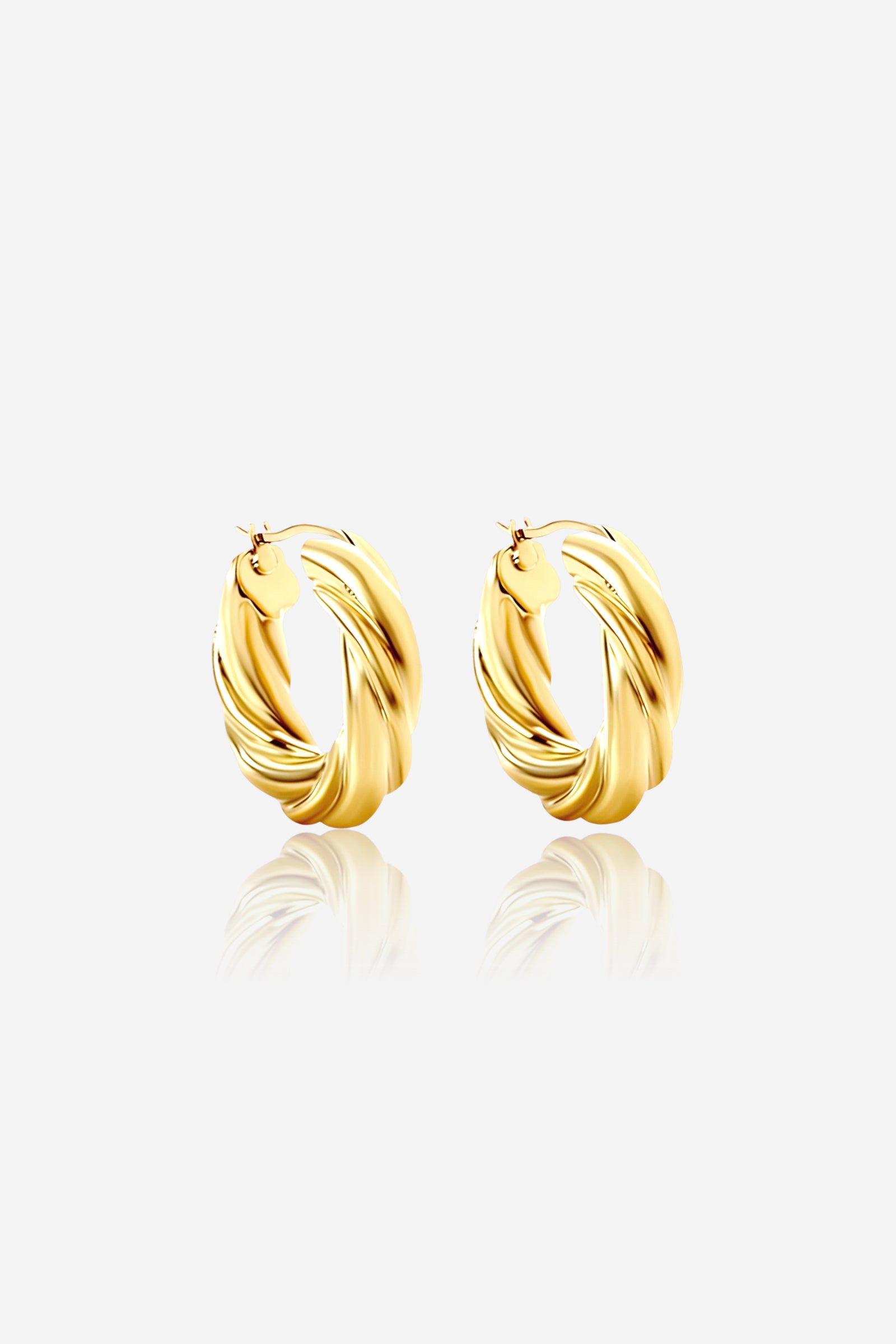 Large twisted gold hoop earrings crafted from PVD 18K gold plated stainless steel, featuring a chunky sculptural design with a bold statement shine — GLISTIA