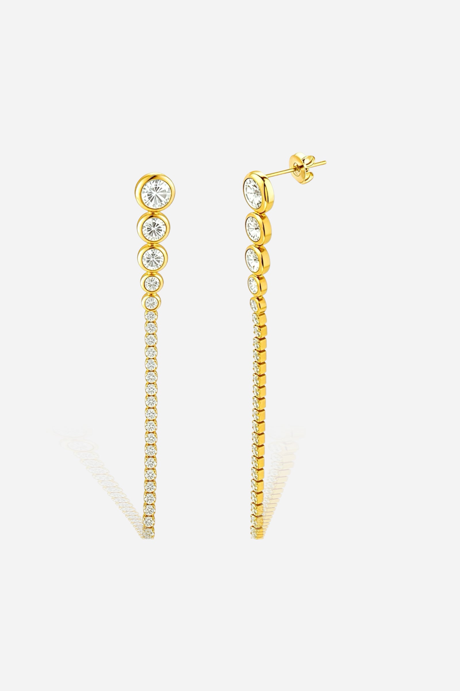 Elegant long crystal drop earrings crafted from stainless steel with PVD 18K gold plating, featuring a linear cascade of bezel-set sparkling stones in a modern minimalist design – GLISTIA.