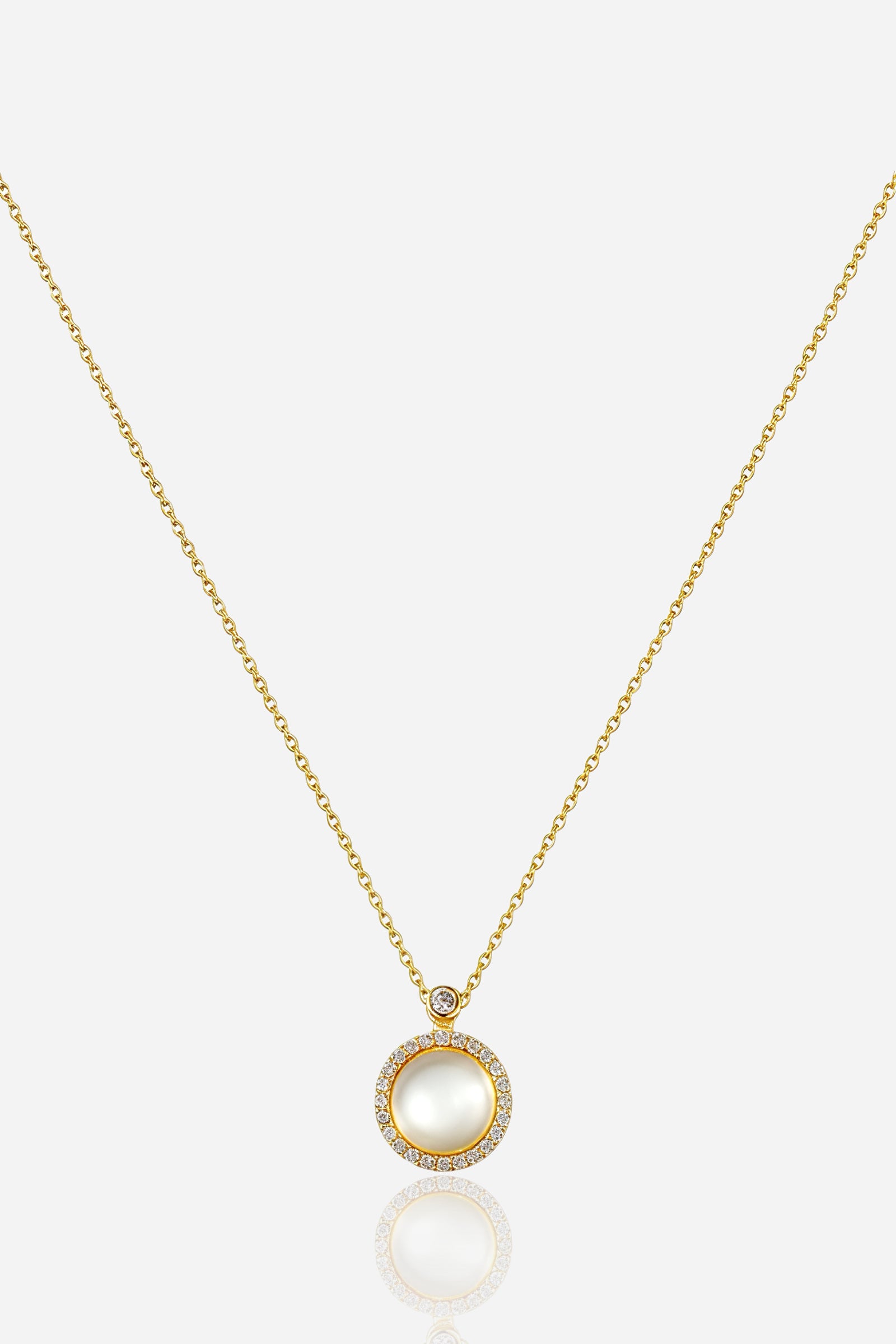 Zoom view of Luna Halo Pendant Necklace featuring crystal halo and smooth centre stone-GLISTIA.