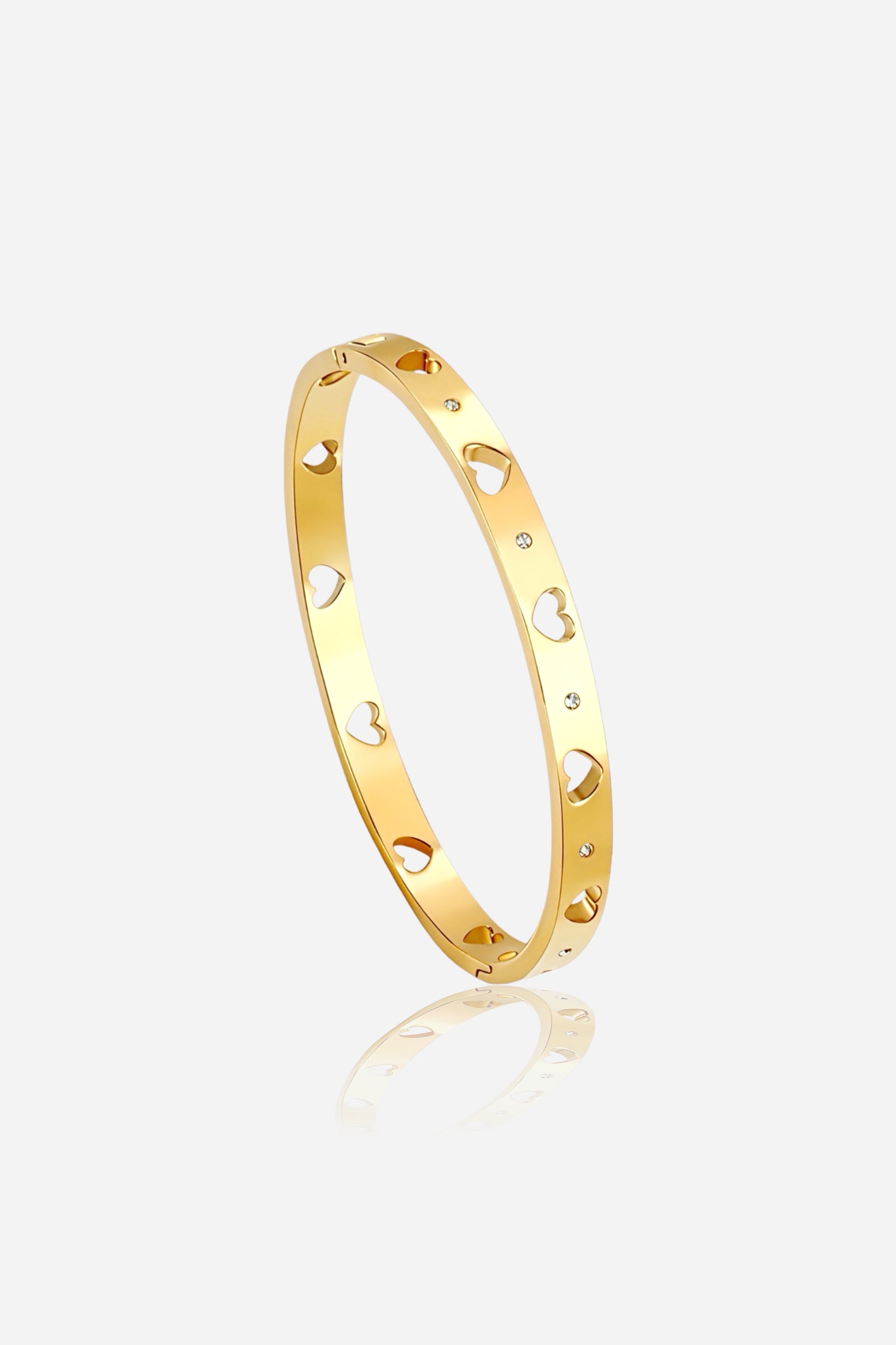 Top angle of GLISTIA 18K gold plated stainless steel open heart bangle, highlighting evenly spaced heart motifs and sparkling crystal inlays along its circular frame.