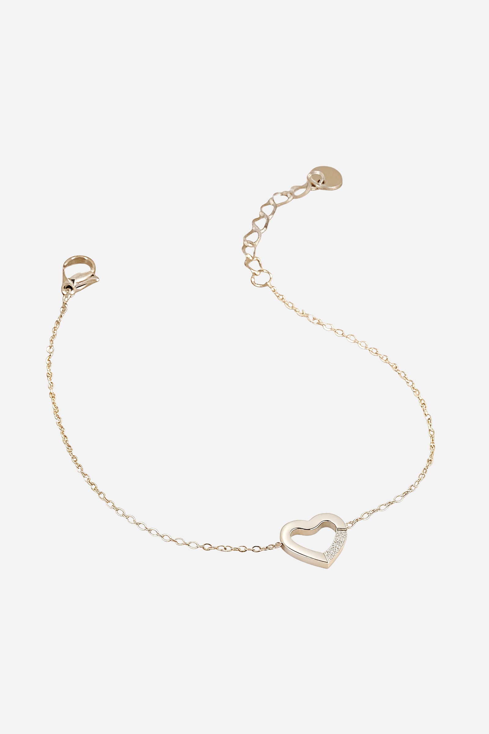 Top view of silver Open Heart bracelet made from stainless steel with minimalist charm - GLISTIA