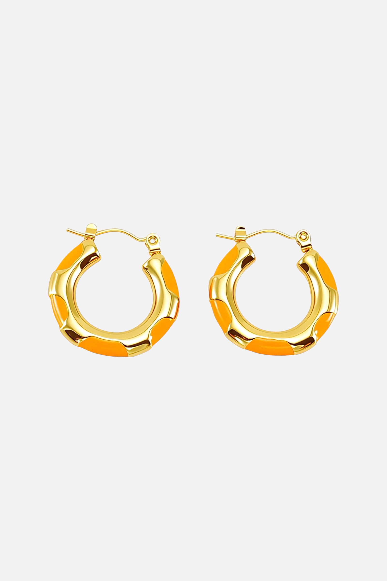 Front view of orange bamboo hoop earrings crafted in stainless steel with PVD 18K gold plating, featuring glossy orange enamel accents and a smooth bamboo-inspired circular design – GLISTIA