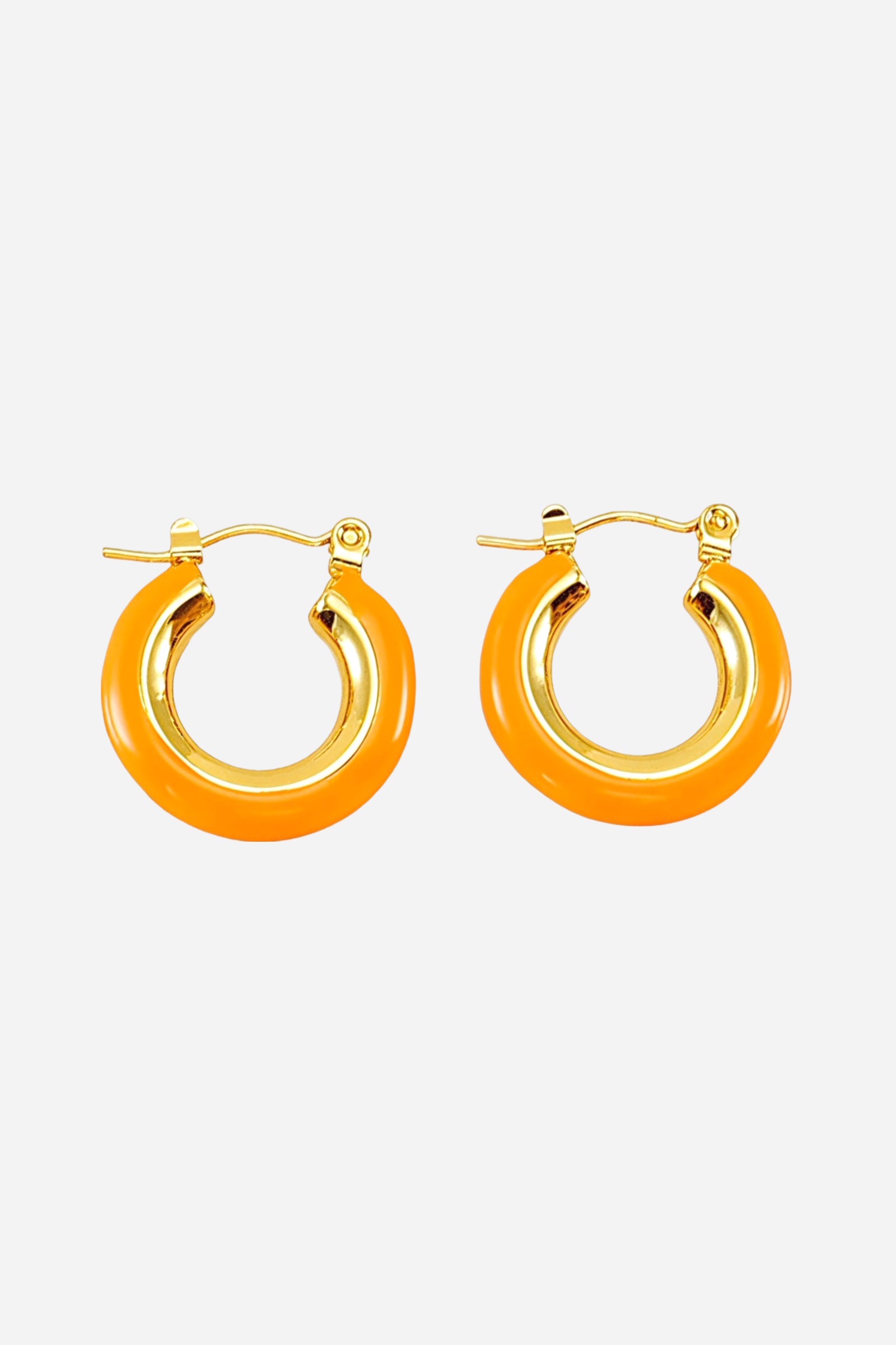 Front-angle view of orange enamel hoop earrings featuring a smooth glossy finish, crafted from stainless steel with radiant PVD 18K gold plating – GLISTIA.