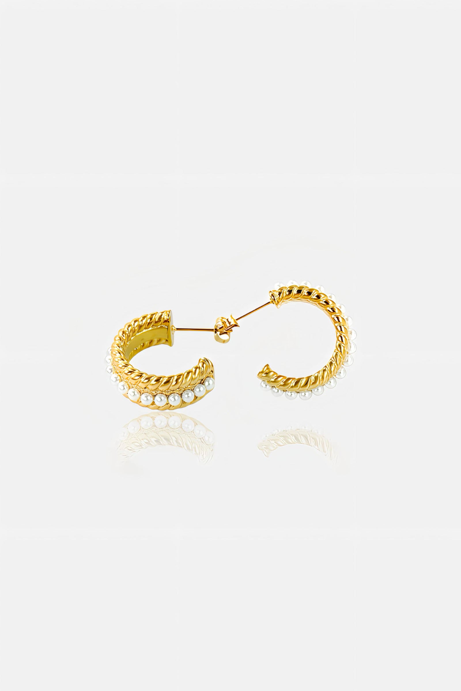 Side view of pearl embellished textured C-hoop earrings in PVD 18K gold plated stainless steel – modern statement style by GLISTIA