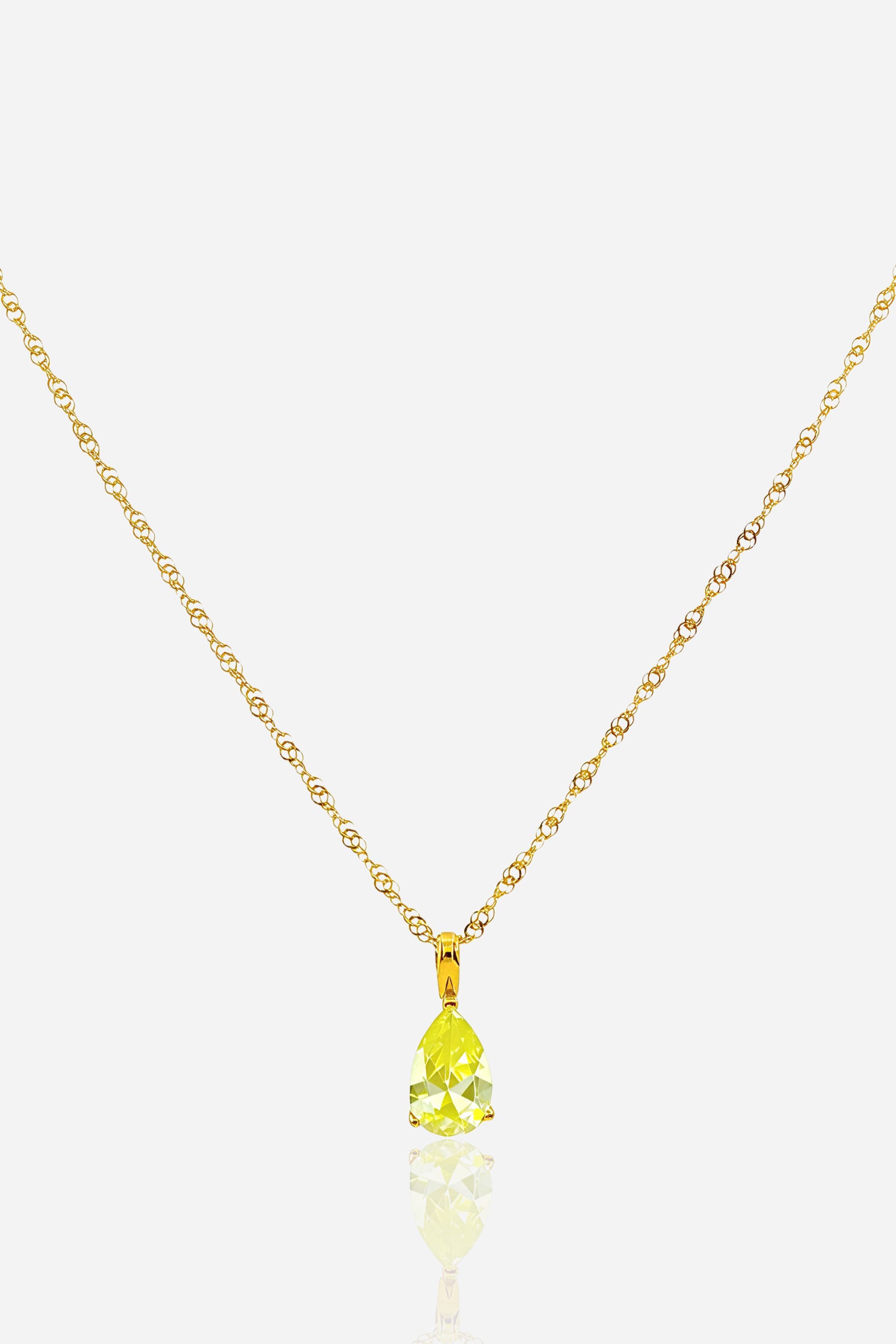 Zoom view of August Peridot Birthstone Pendant showcasing vivid green zircon and 18K PVD gold plated detailing by Glistia.