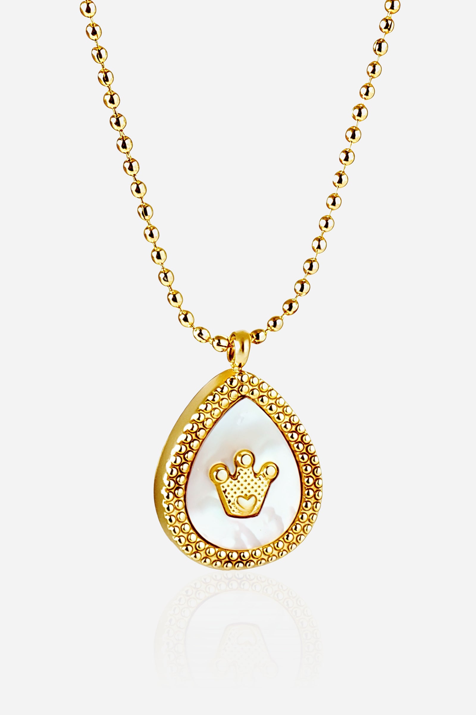 GLISTIA Regalia Crown Pendant Necklace front view with gold teardrop frame and mother-of-pearl centre.