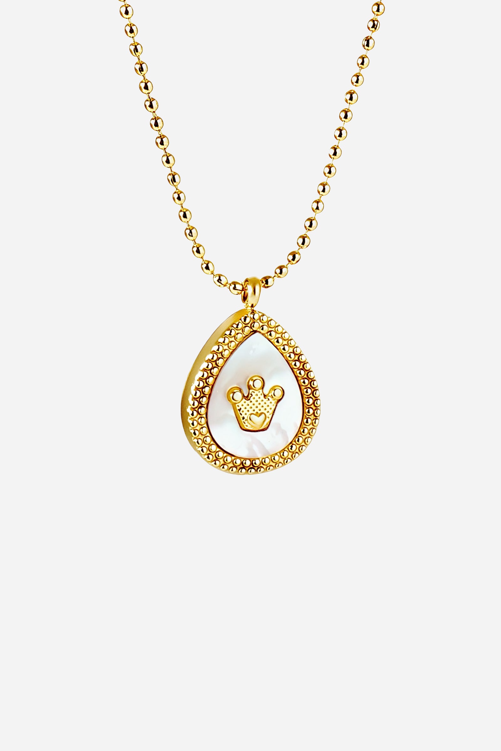 Top-view image of GLISTIA Regalia Crown Necklace showcasing the 18K PVD gold plated teardrop pendant.