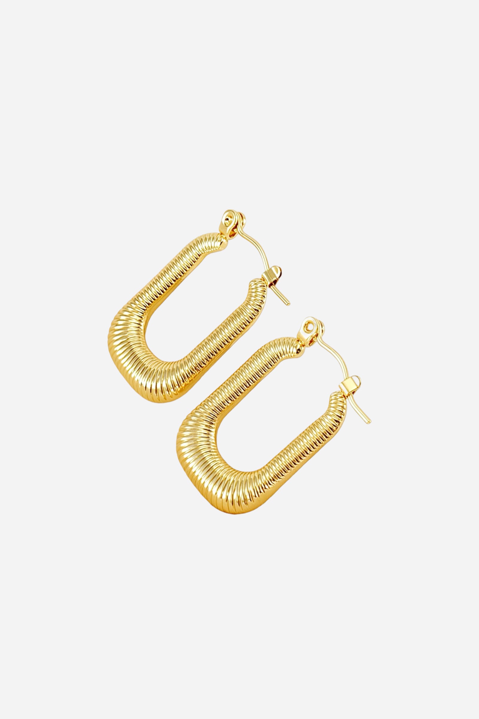 Side view of ribbed rectangle hoop earrings crafted in stainless steel with a polished 18K gold plated finish, featuring a modern ribbed texture and elegant U-shaped design – GLISTIA.