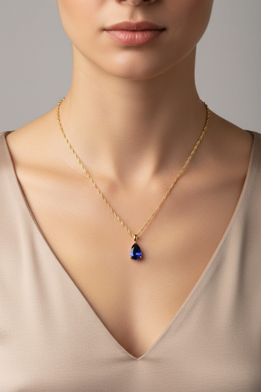 Sapphire birthstone necklace for September with blue zircon teardrop pendant in 18K PVD gold plated stainless steel