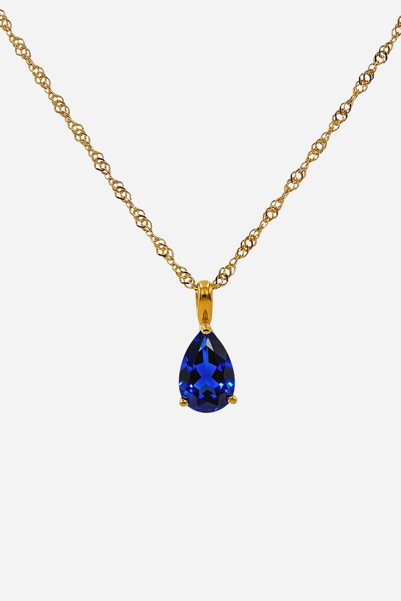Top view of Sapphire September Birthstone Necklace featuring blue zircon teardrop pendant – GLISTIA