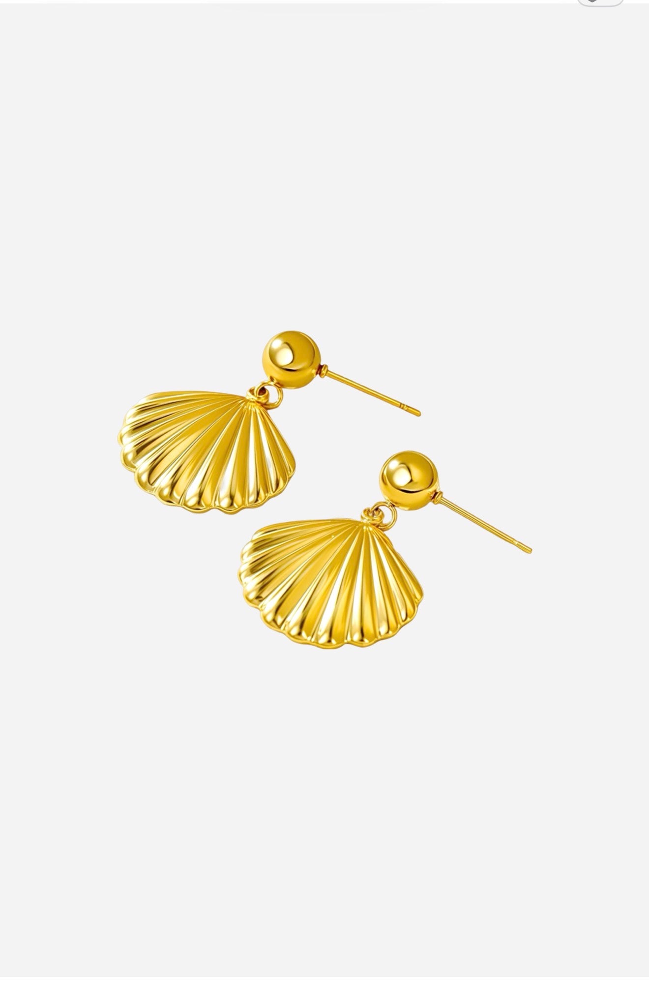Top view of seashell drop earrings crafted from stainless steel with a luminous PVD 18K gold plated finish, featuring sculpted seashell-shaped drops and smooth round studs - GLISTIA.