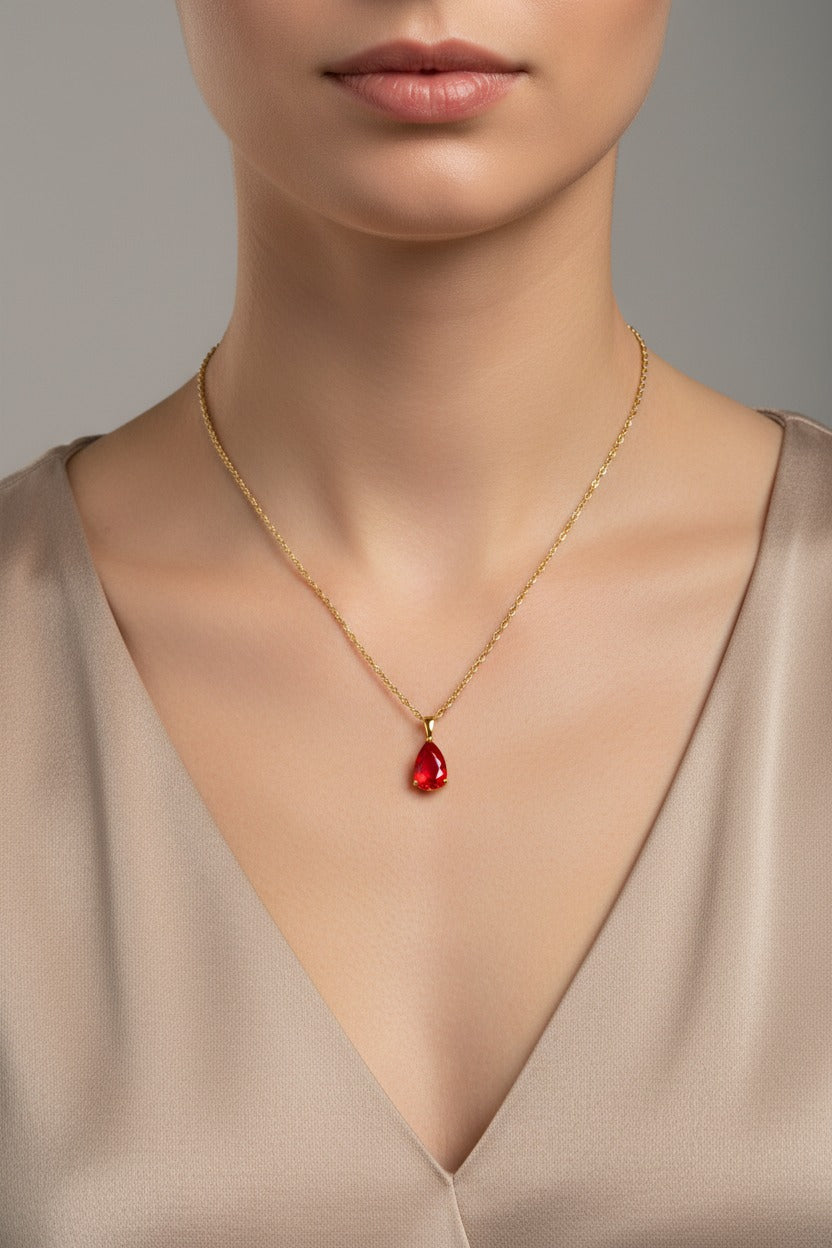 Siam birthstone necklace for January with red teardrop zircon in 18K PVD gold plated stainless steel on a delicate rope chain