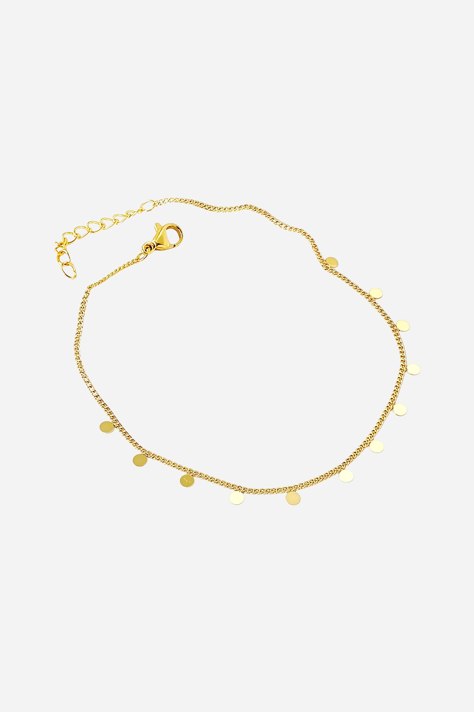 Top view of the gold Soleil Disc Anklet showing delicate chain and evenly spaced disc charms - GLISTIA.