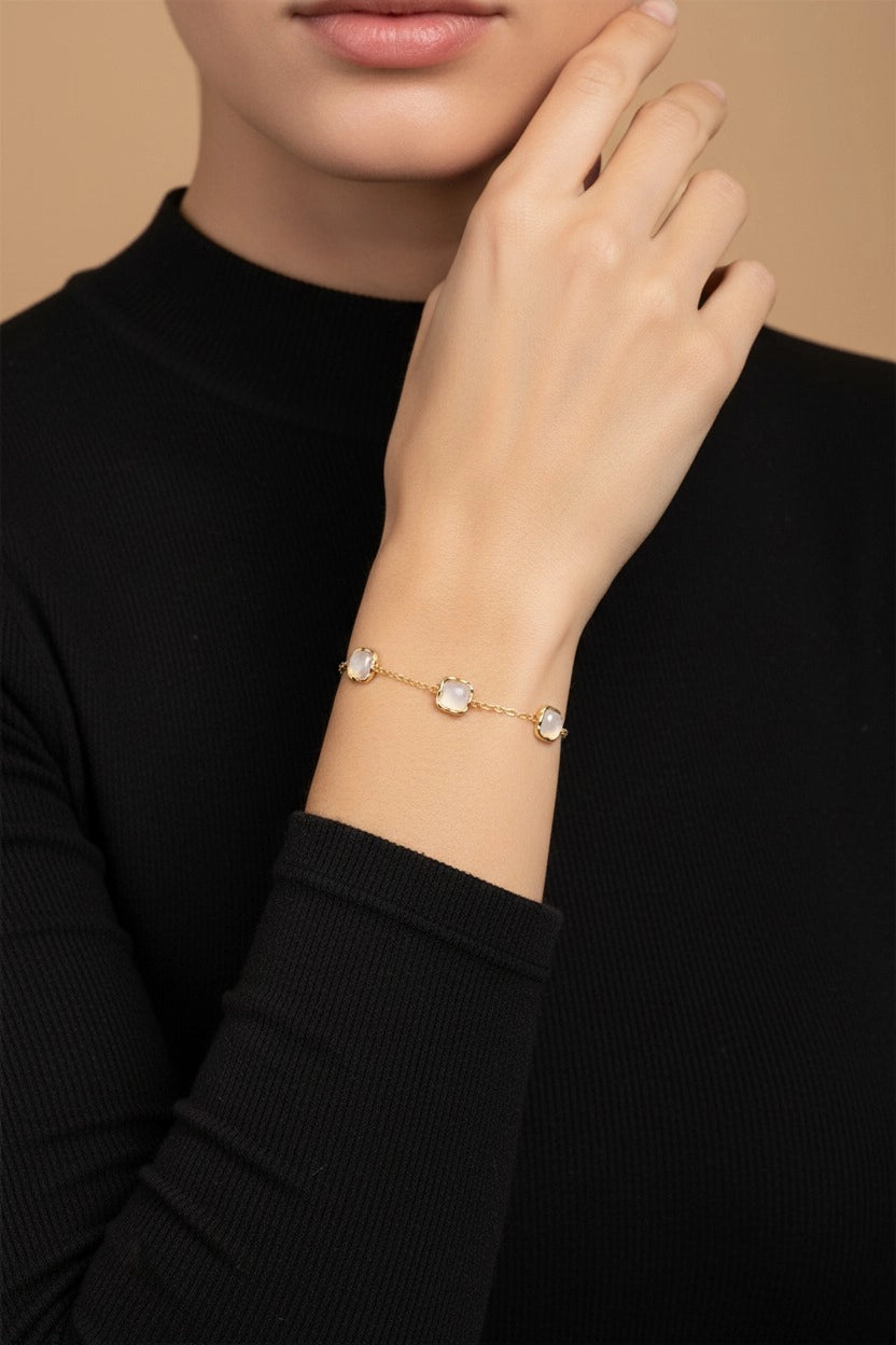 18K PVD gold plated stainless steel bracelet with square gemstone detailing and refined chain design