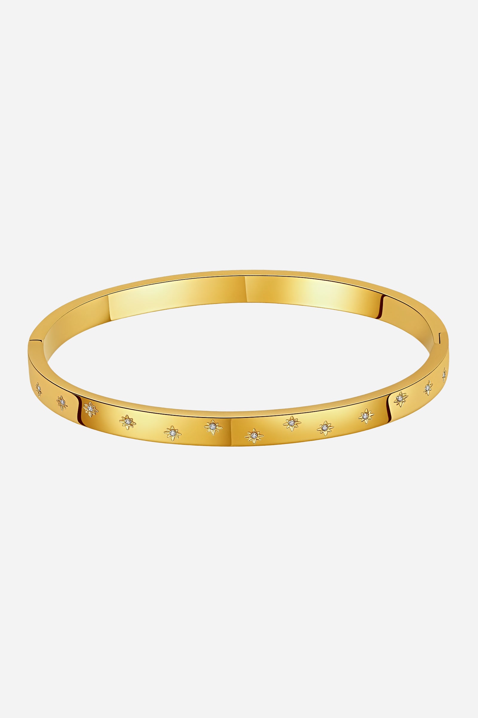 Front view of GLISTIA Star Crystal Bangle crafted from stainless steel with PVD 18K gold plating, featuring engraved star motifs accented with cubic zirconia crystals.