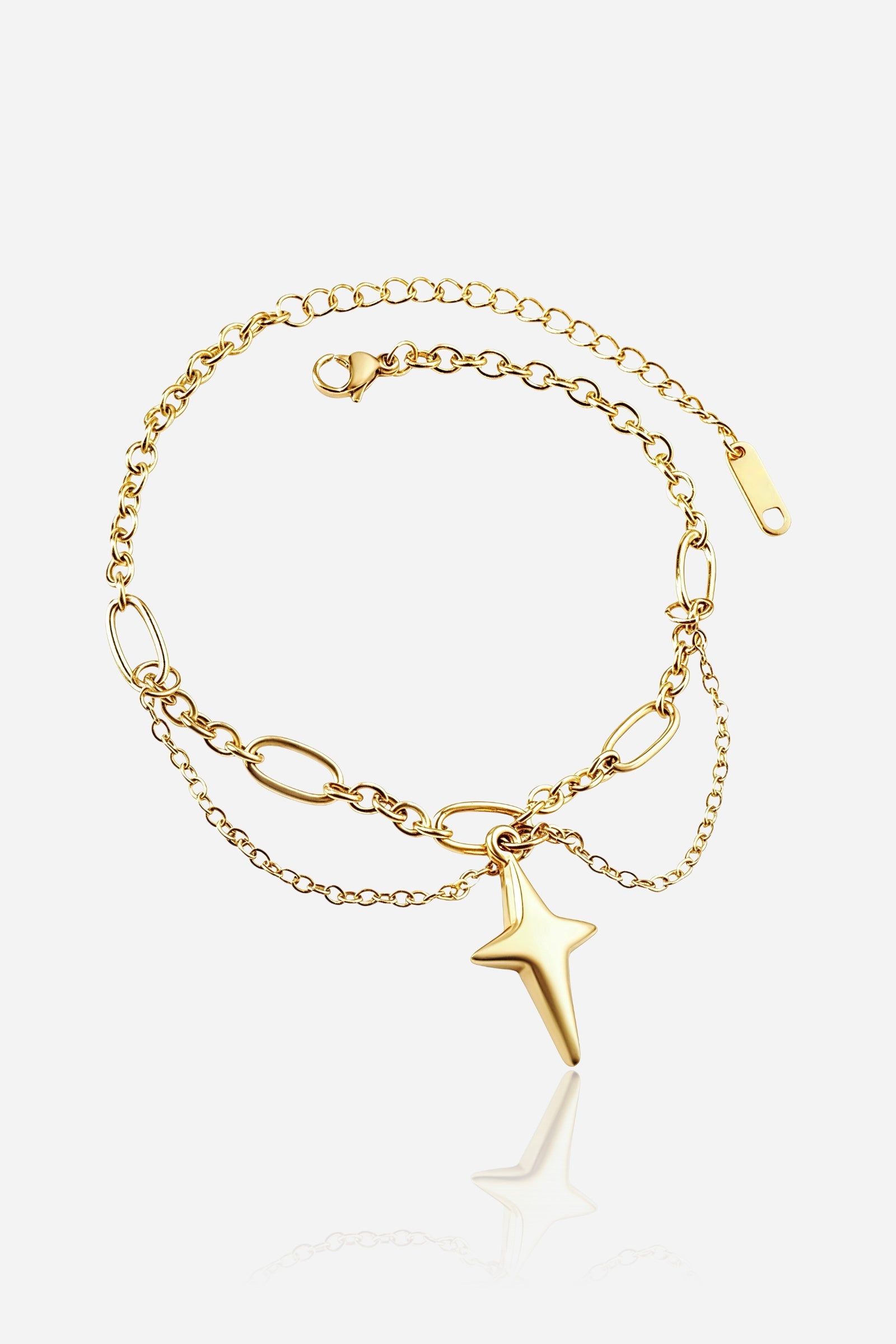 GLISTIA Stellar Cross layered bracelet in PVD 18K gold plated stainless steel shown from the front with a polished cross charm.