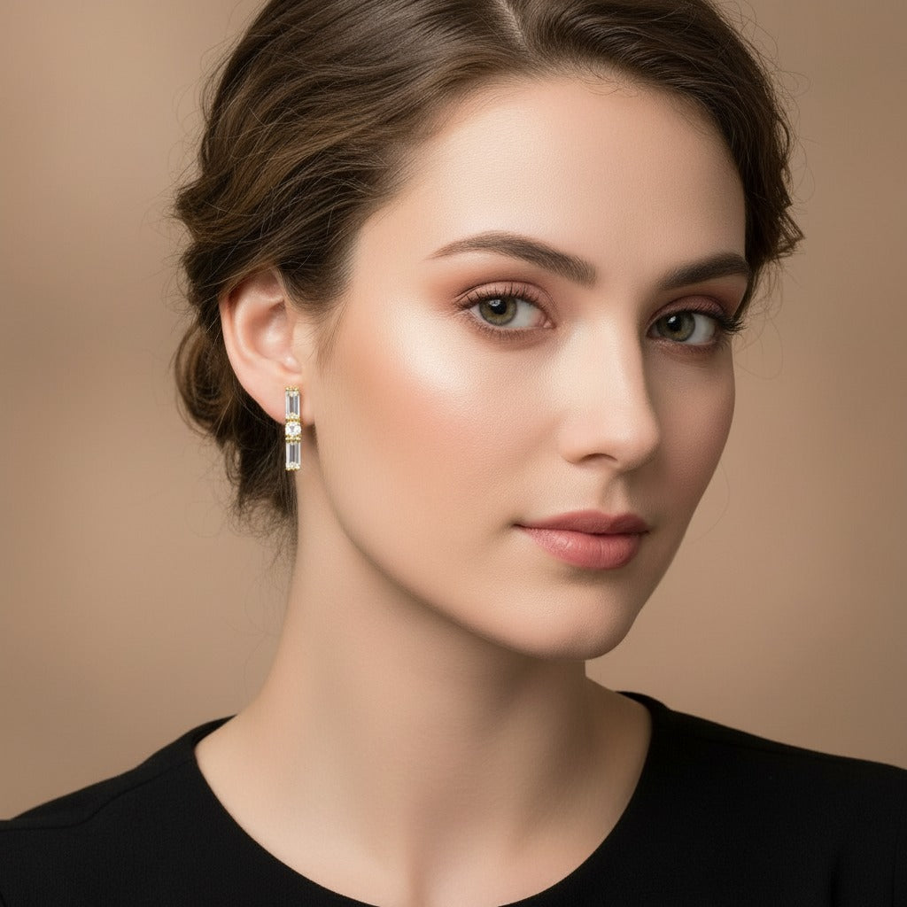 Stud earrings in an 18K PVD gold plated finish arranged in a straight line, designed for comfortable all-day wear and everyday styling.