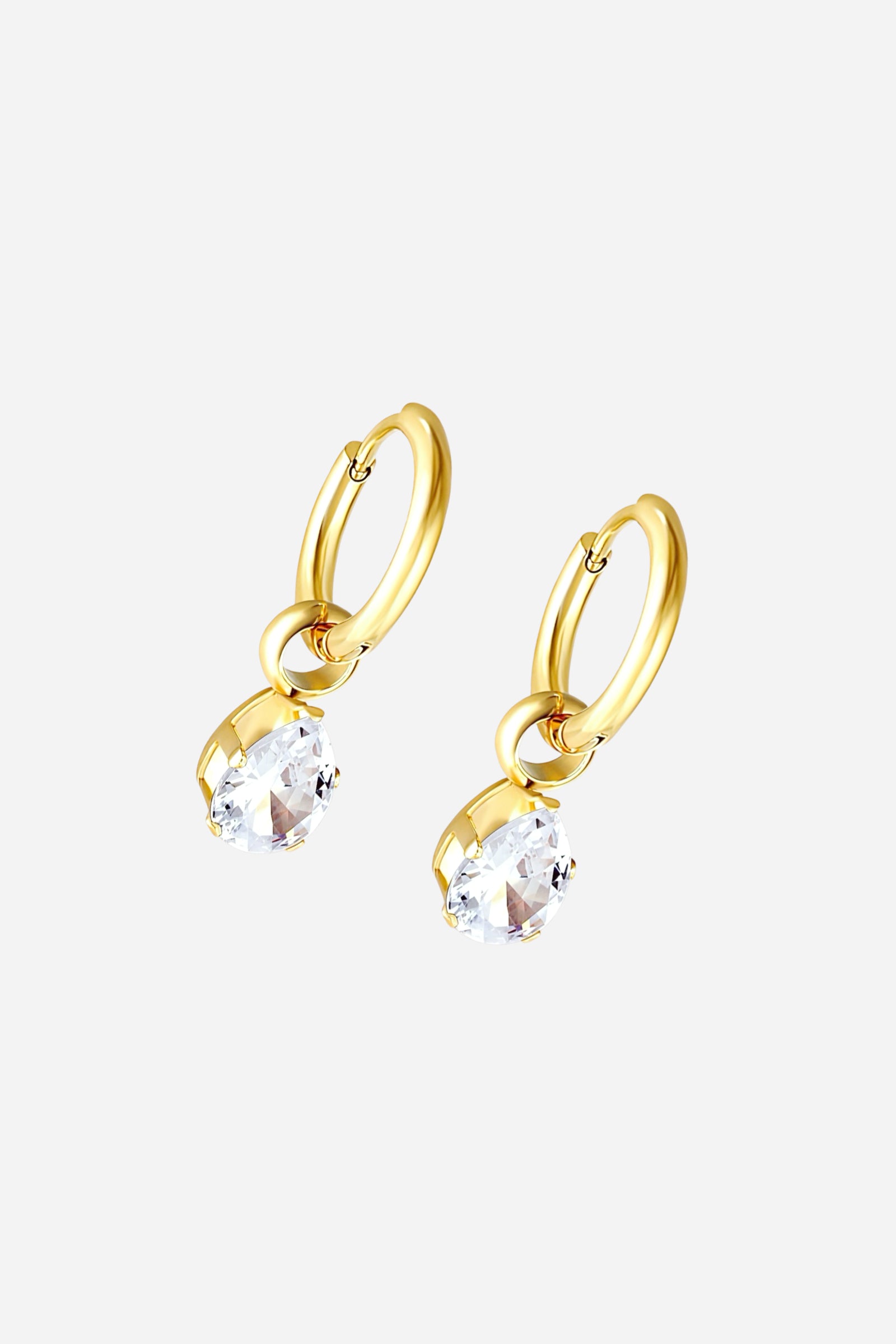 Pair of teardrop crystal drop hoop earrings crafted from stainless steel with a radiant PVD 18K gold-plated finish, featuring clear teardrop-cut crystals for a refined modern look – GLISTIA.