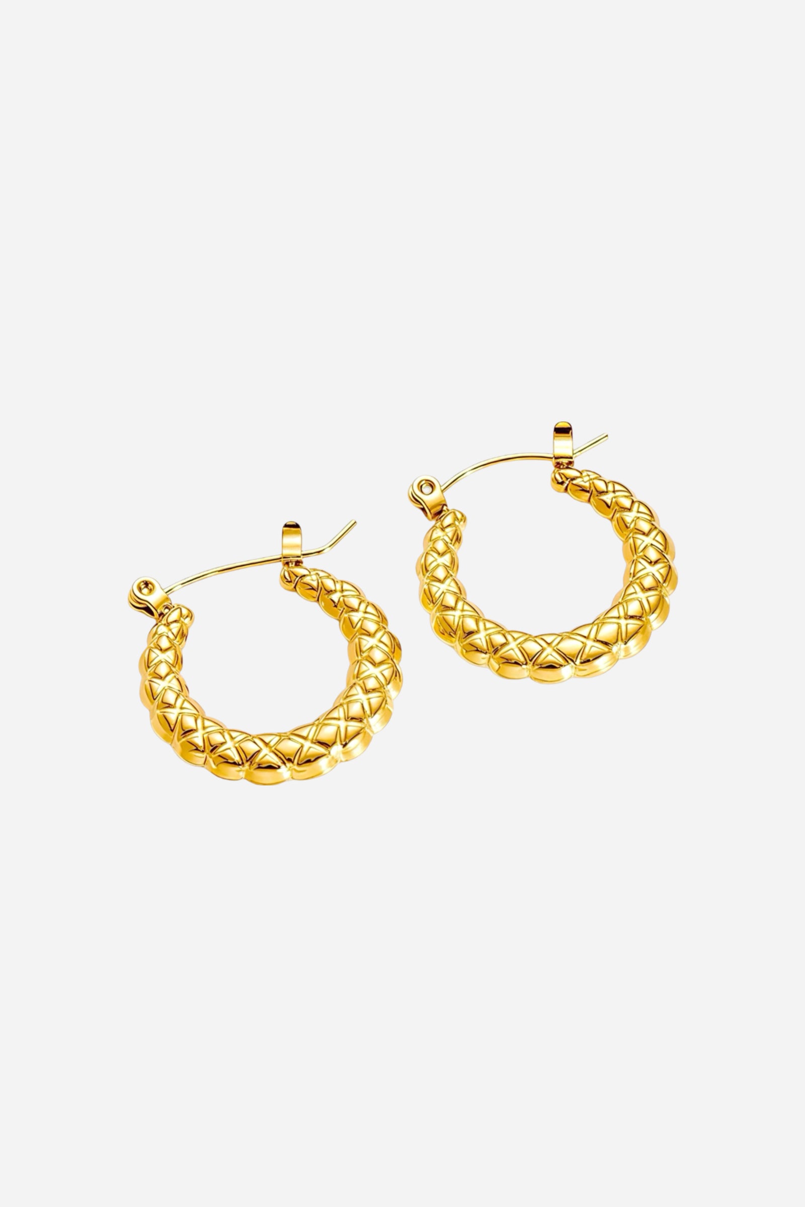 Angled view of textured dome hoop earrings in PVD 18K gold plated stainless steel, featuring quilted detailing and a polished dome design -GLISTIA